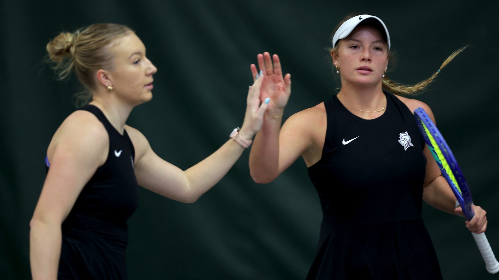 Vendula Kryslova and Reese Parker high-five