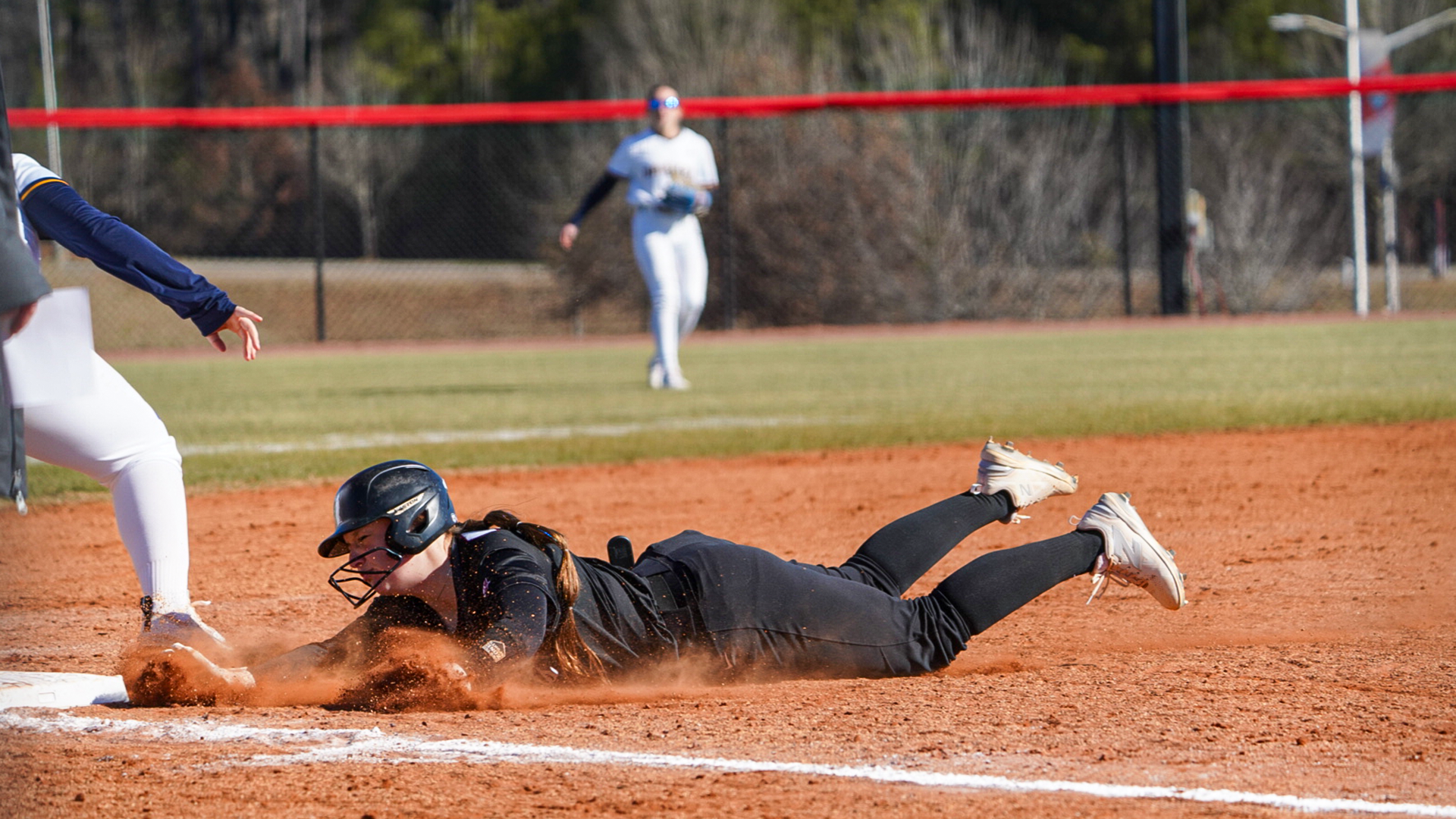 Jacklyn Zuege dives into a base at West Georgia