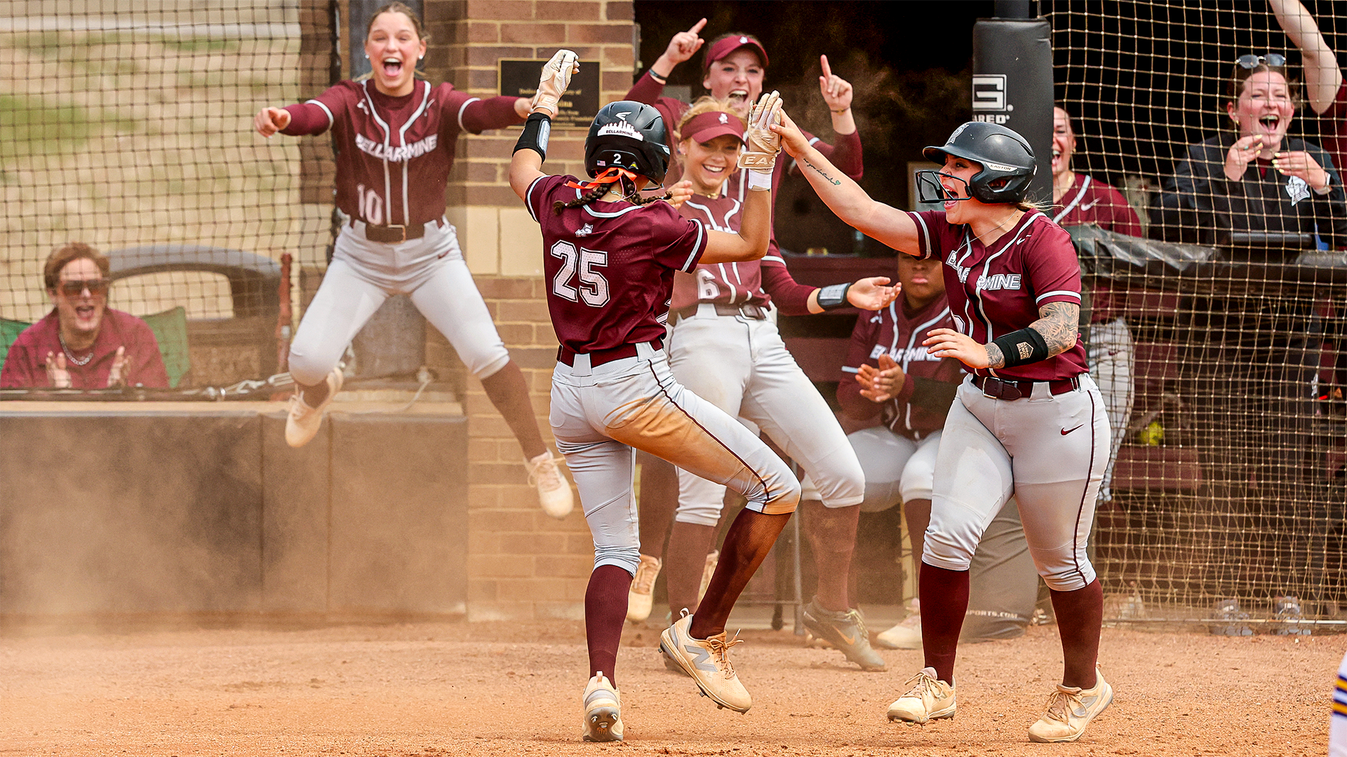 Jayla Manning and Nicole Waters celebrating a run against Lipscomb