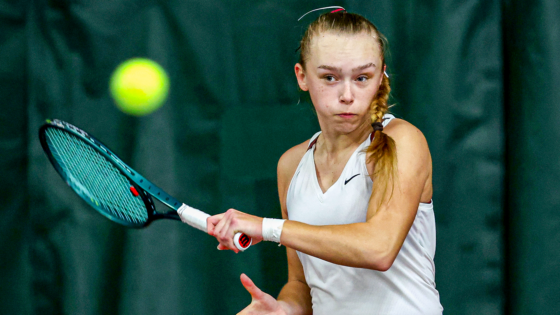 Marika Caruk returns a ball