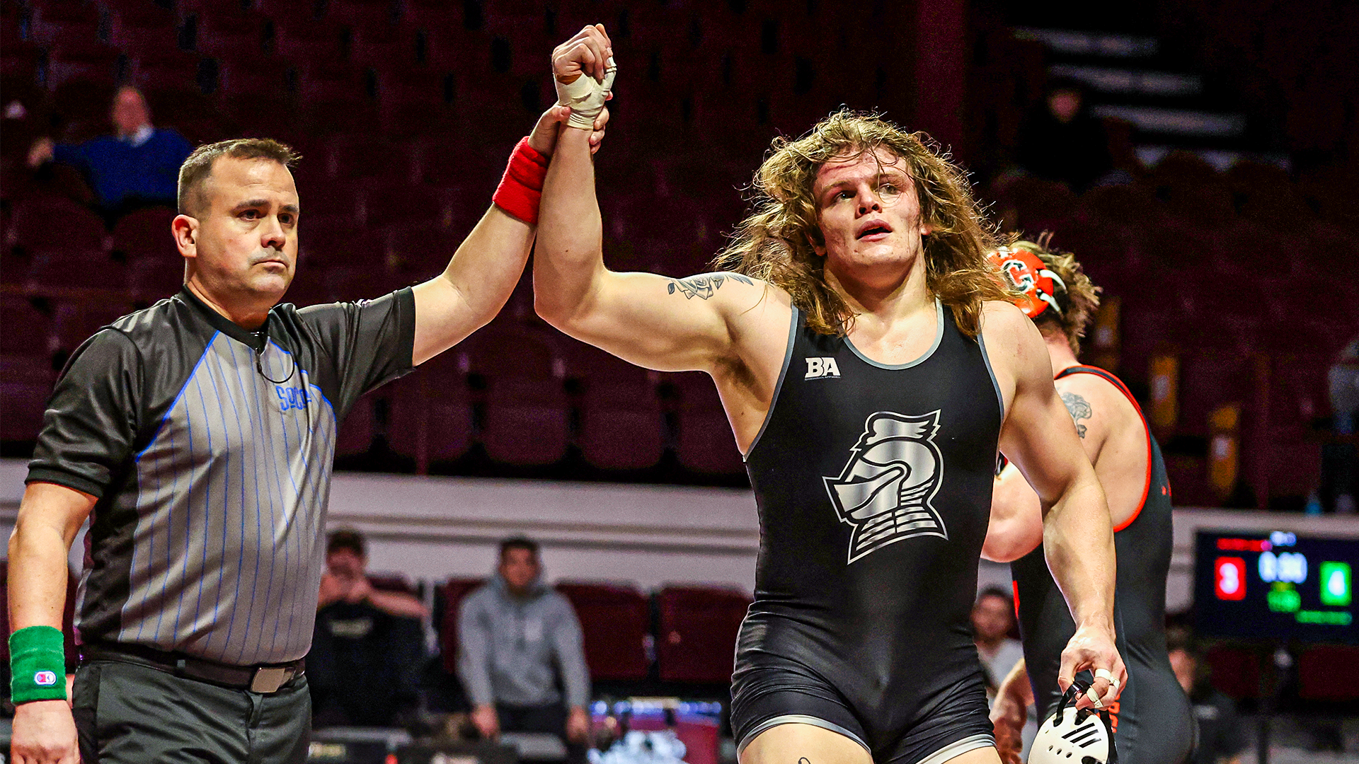 Daulton Mayer has his hand raised against Campbell