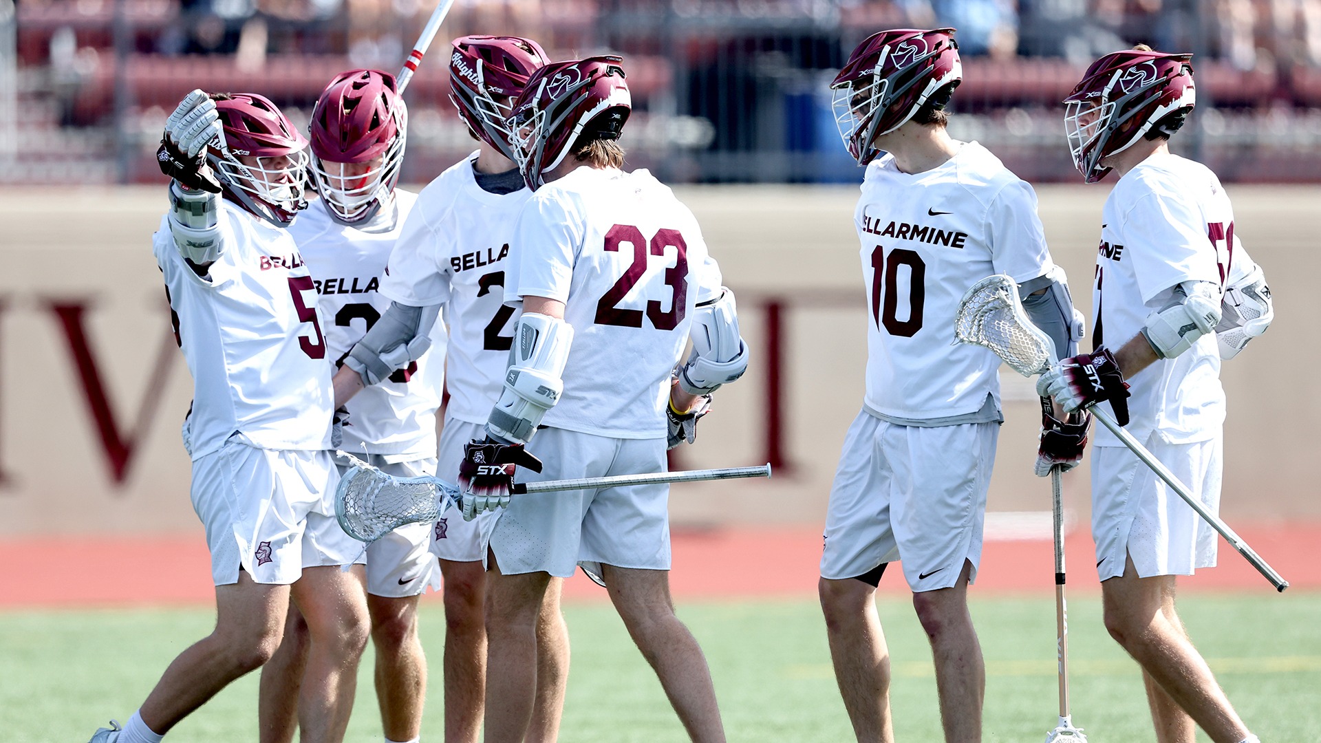 Knights celebrate a goal against Marquette.