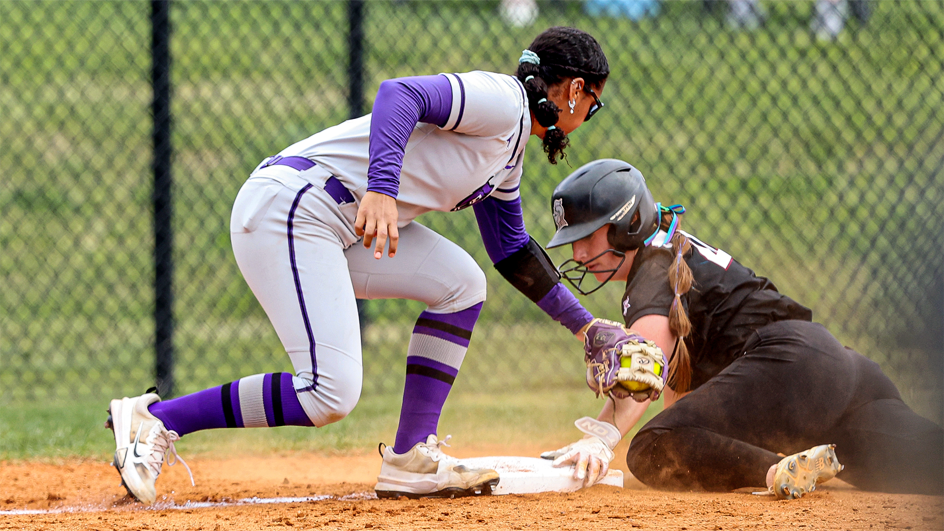 Jacklyn Zuege slides into third before the tag against Central Arkansas