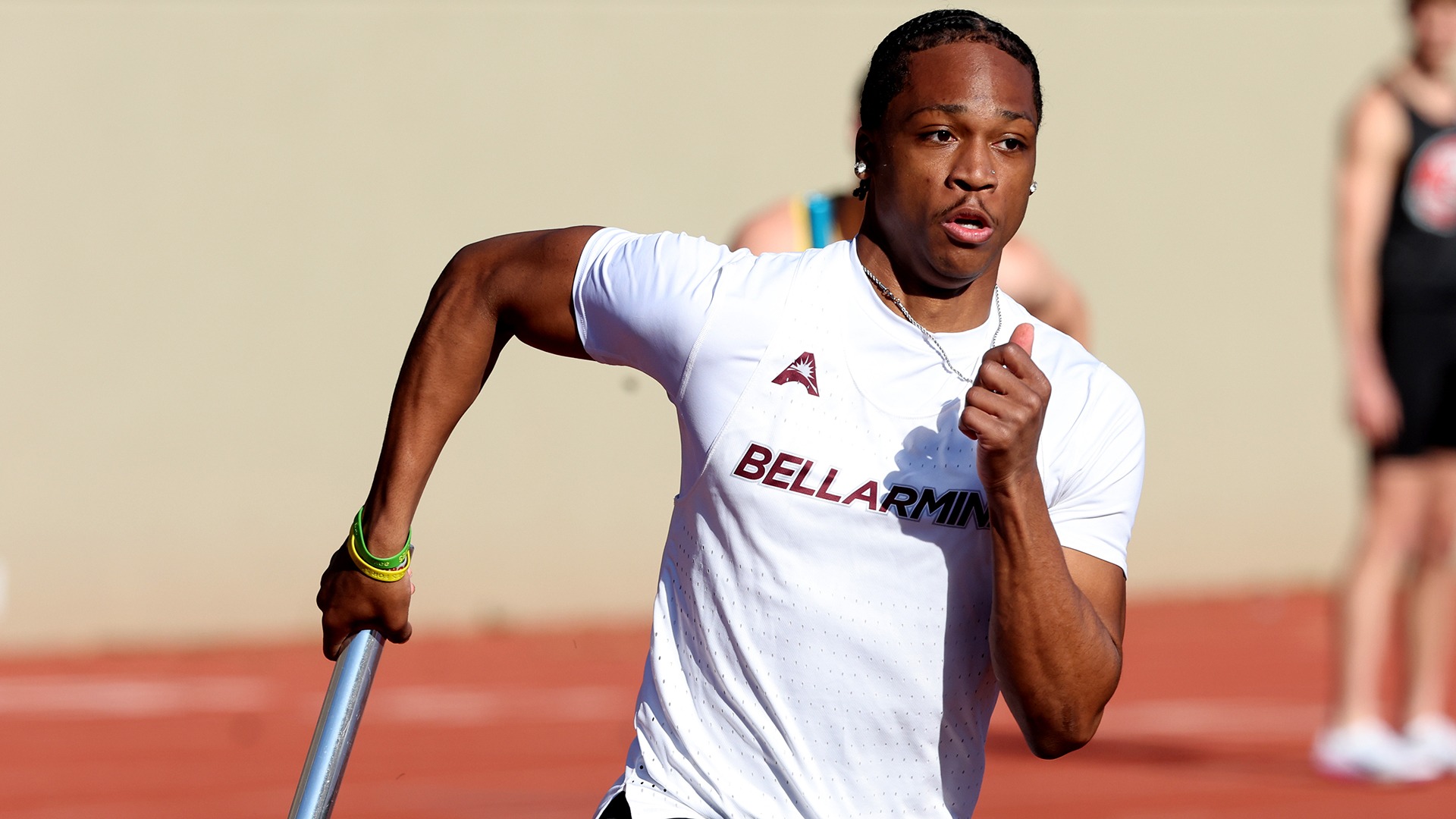 Taevion Sweeney competes in a relay at the Jim Vargo Invitational.