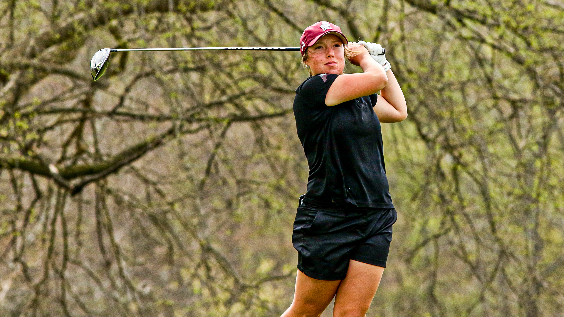 Geriann Ackermann holds her finish on the tee box at the Colonel Classic
