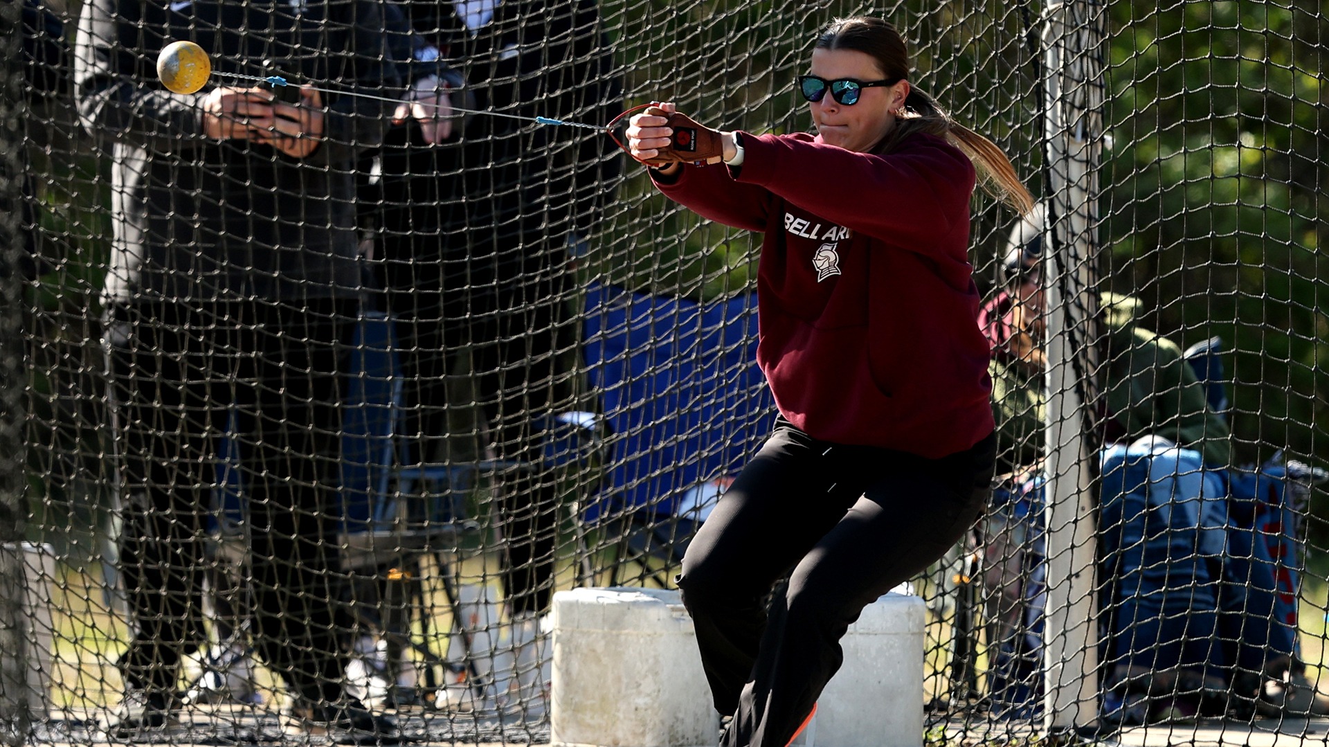 Caysie Brady tosses the hammer throw at the Jim Vargo Invitational.