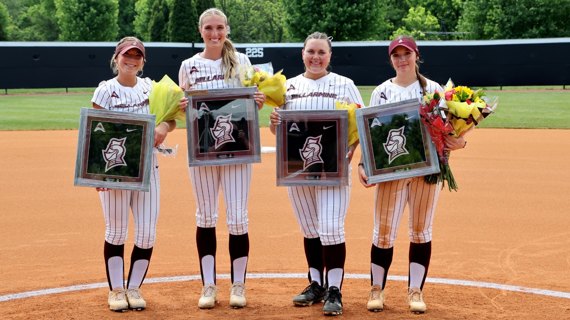 Softball seniors Madison Davis, Elli Jensen, Addison Kerr and Jacklyn Zuege on senior day
