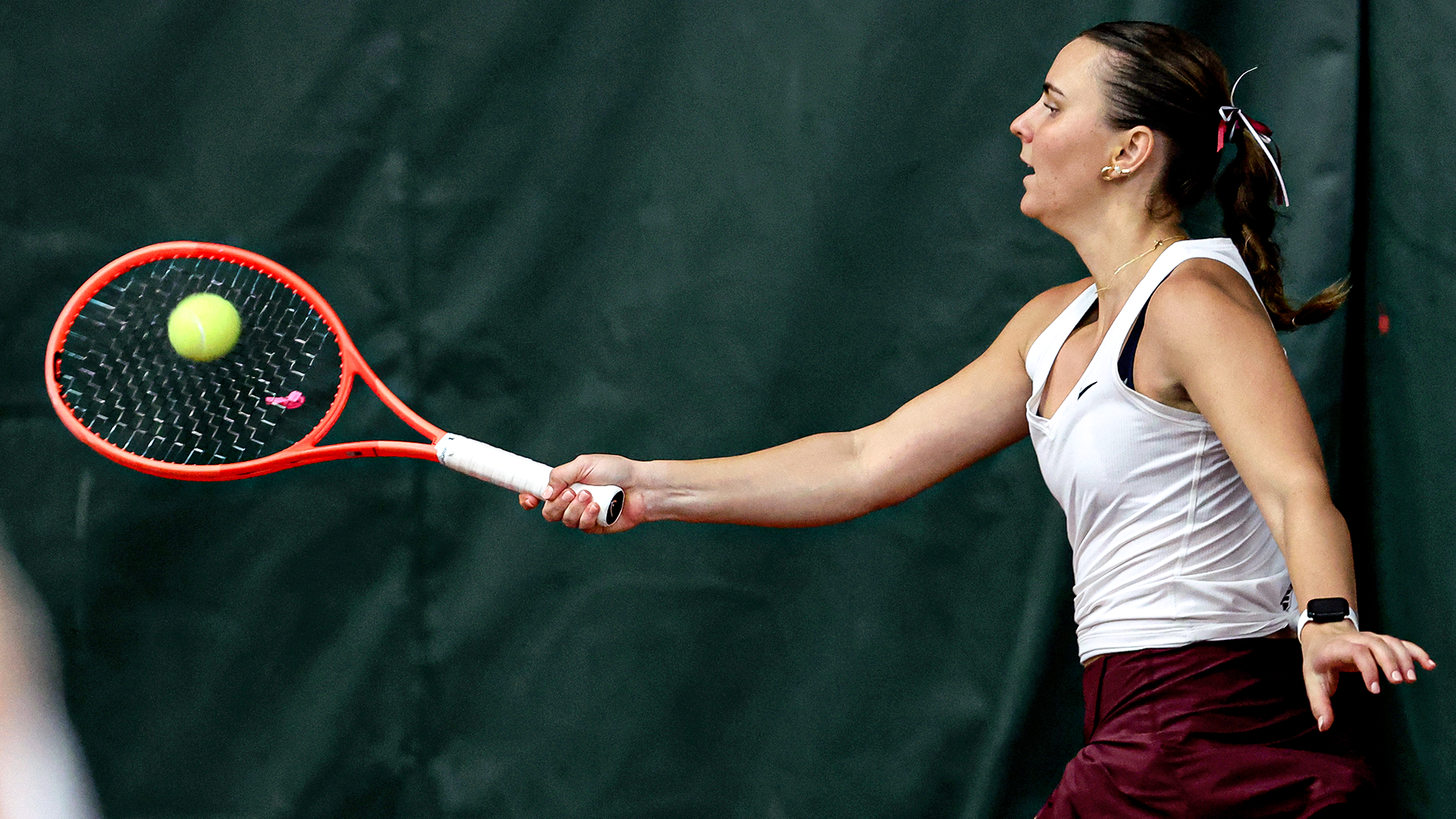 Lillie Willis reaches for a return shot