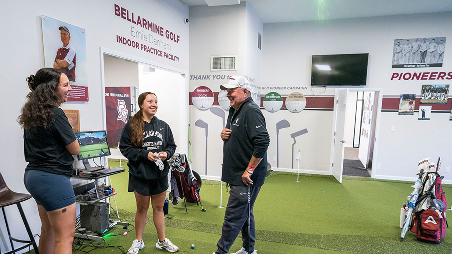 Director of Golf Bruce Brown talking with Abigayle Buchanan and Geriann Ackerman