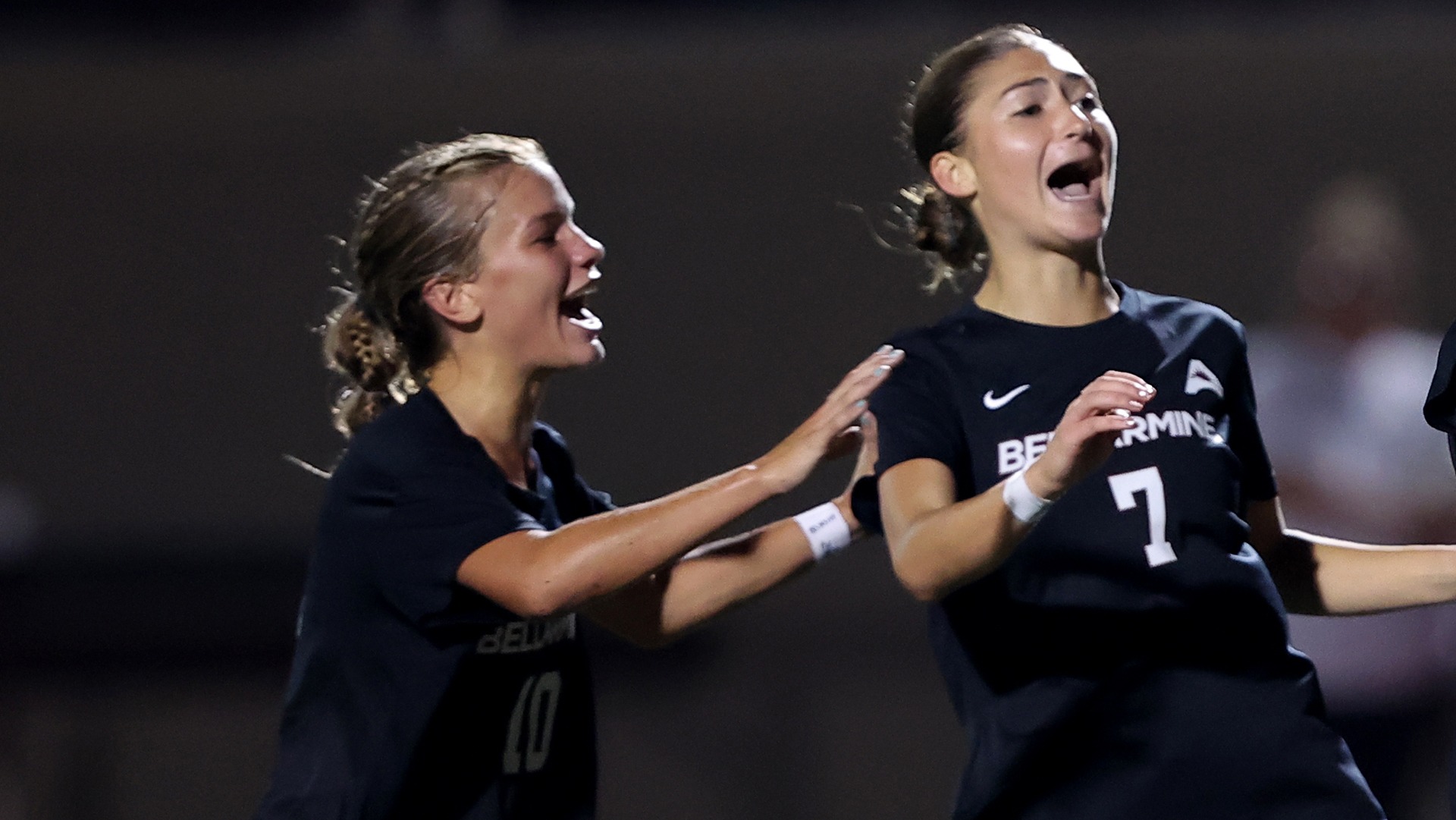 Nora Dimmitt and Dakota Bramer celebrate a Bellarmine goal.