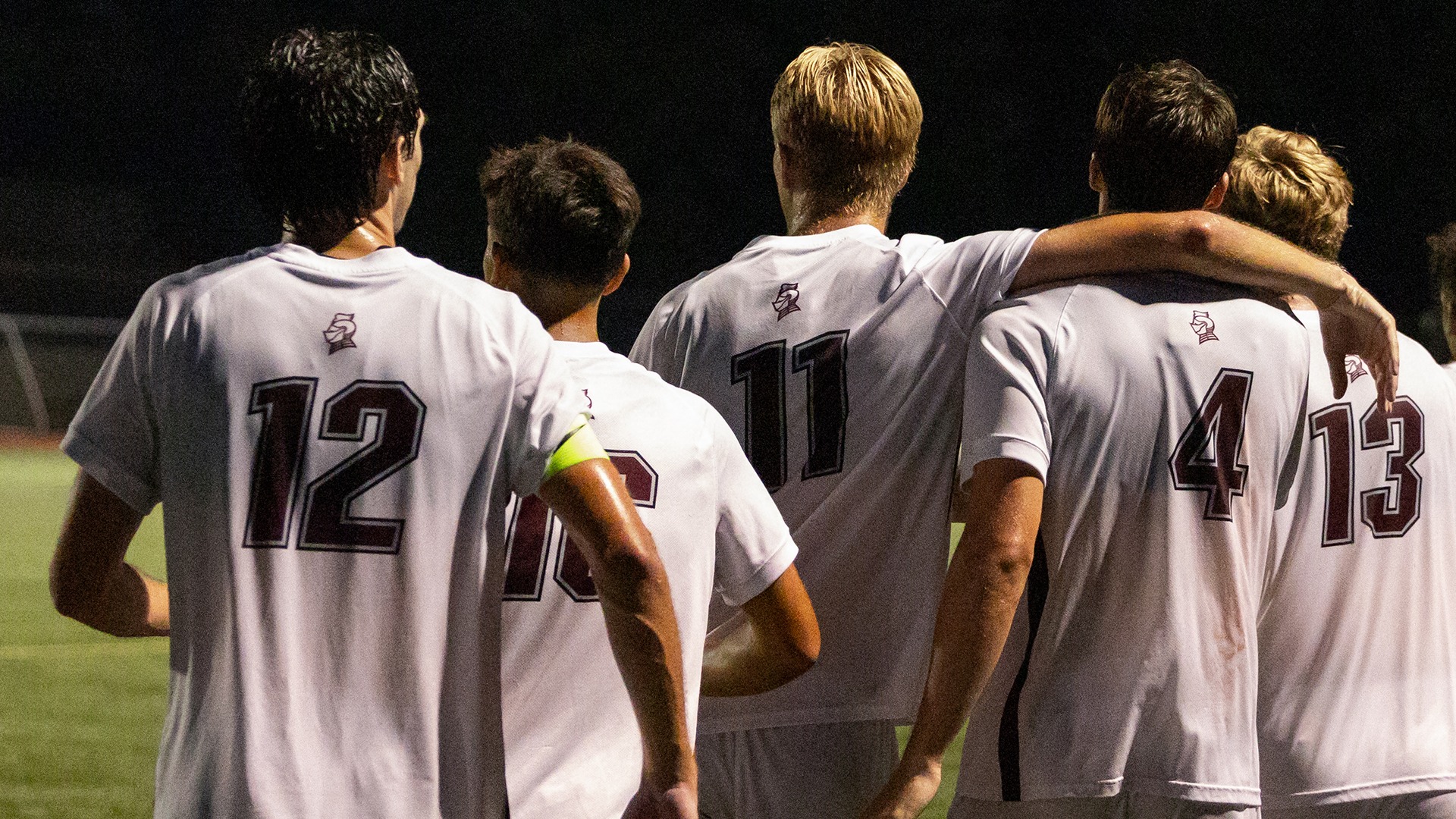 Bellarmine men's soccer celebrates a goal.