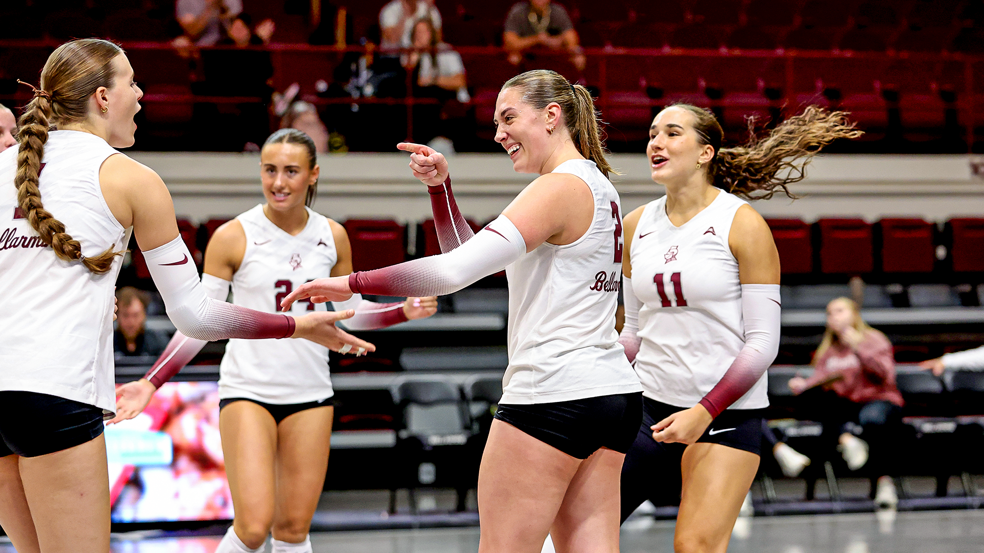 Natalie Bland celebrates with Mady Yaden