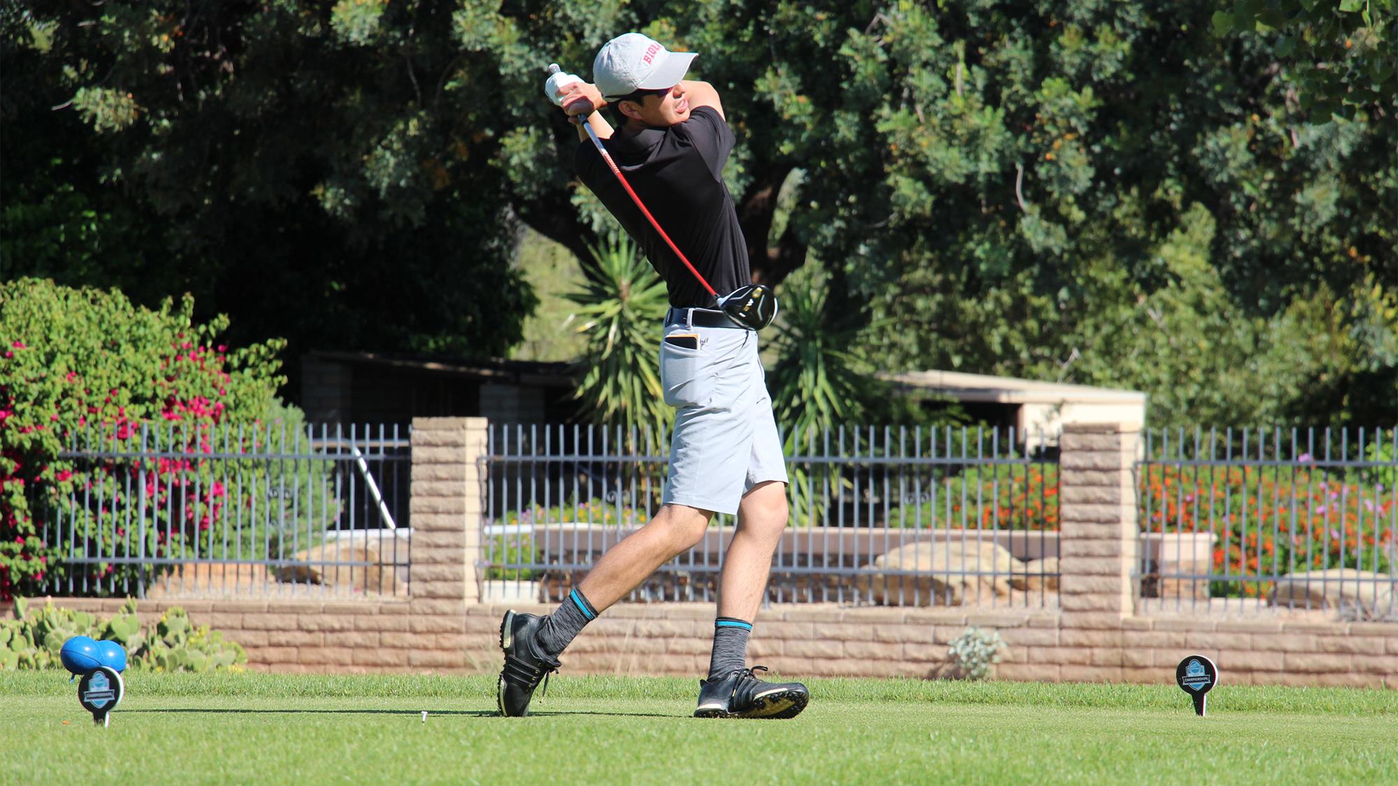 Austin Bishop swinging from the tee box