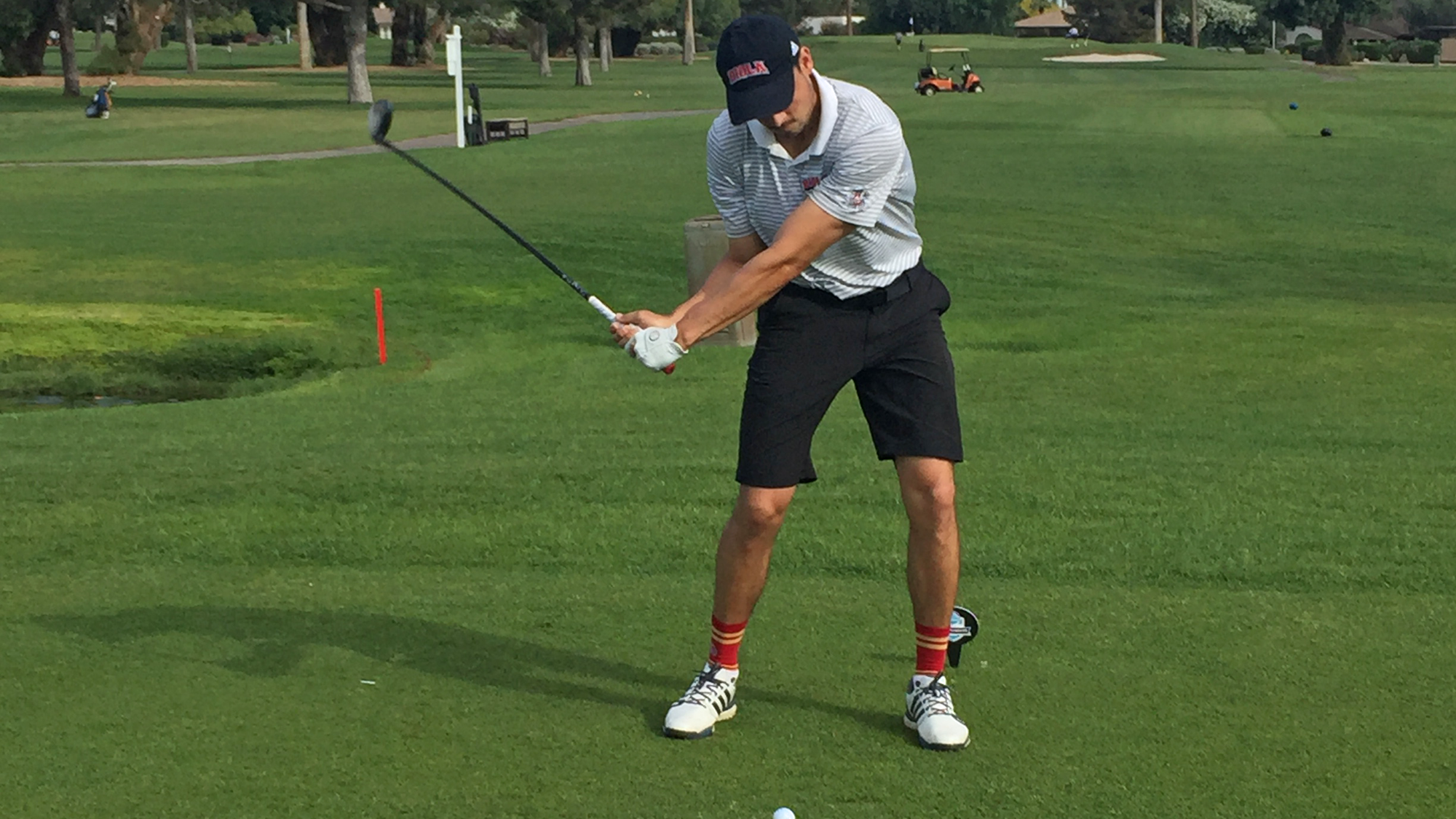 Kyle McAbee swinging from the tee box