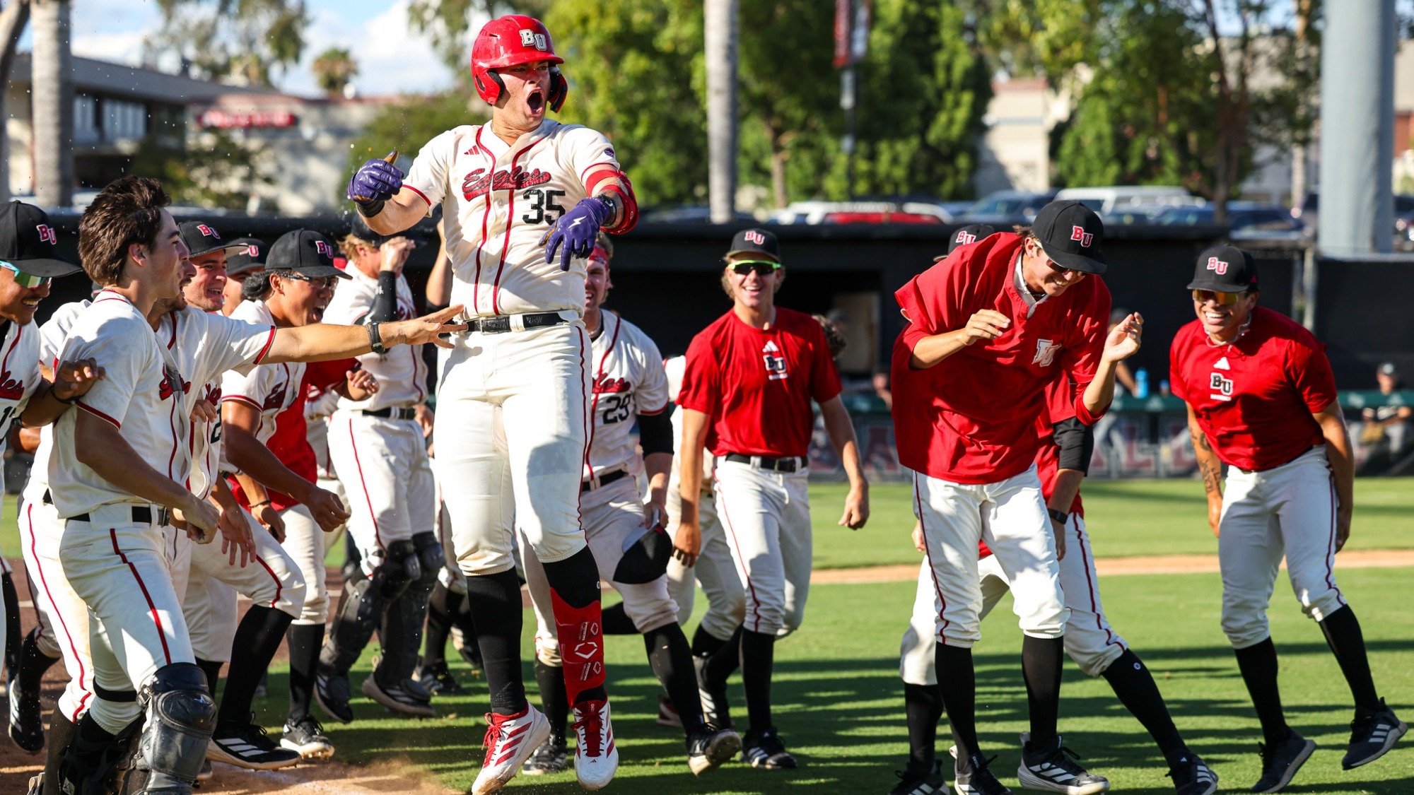 Whitman celebrates with team