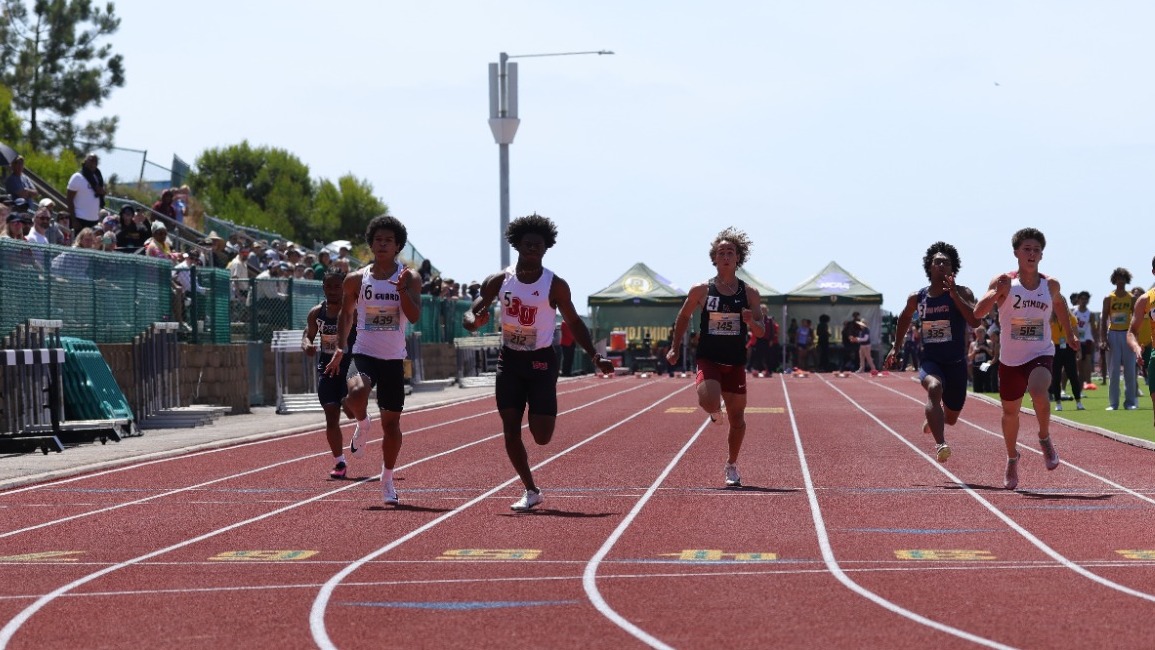Tommy Crossing the finish line
