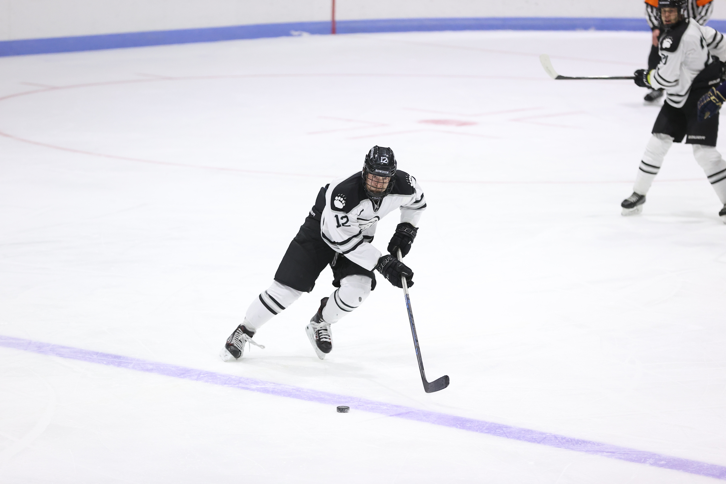 Late Goals Sink Men's Hockey at Trinity Bowdoin College
