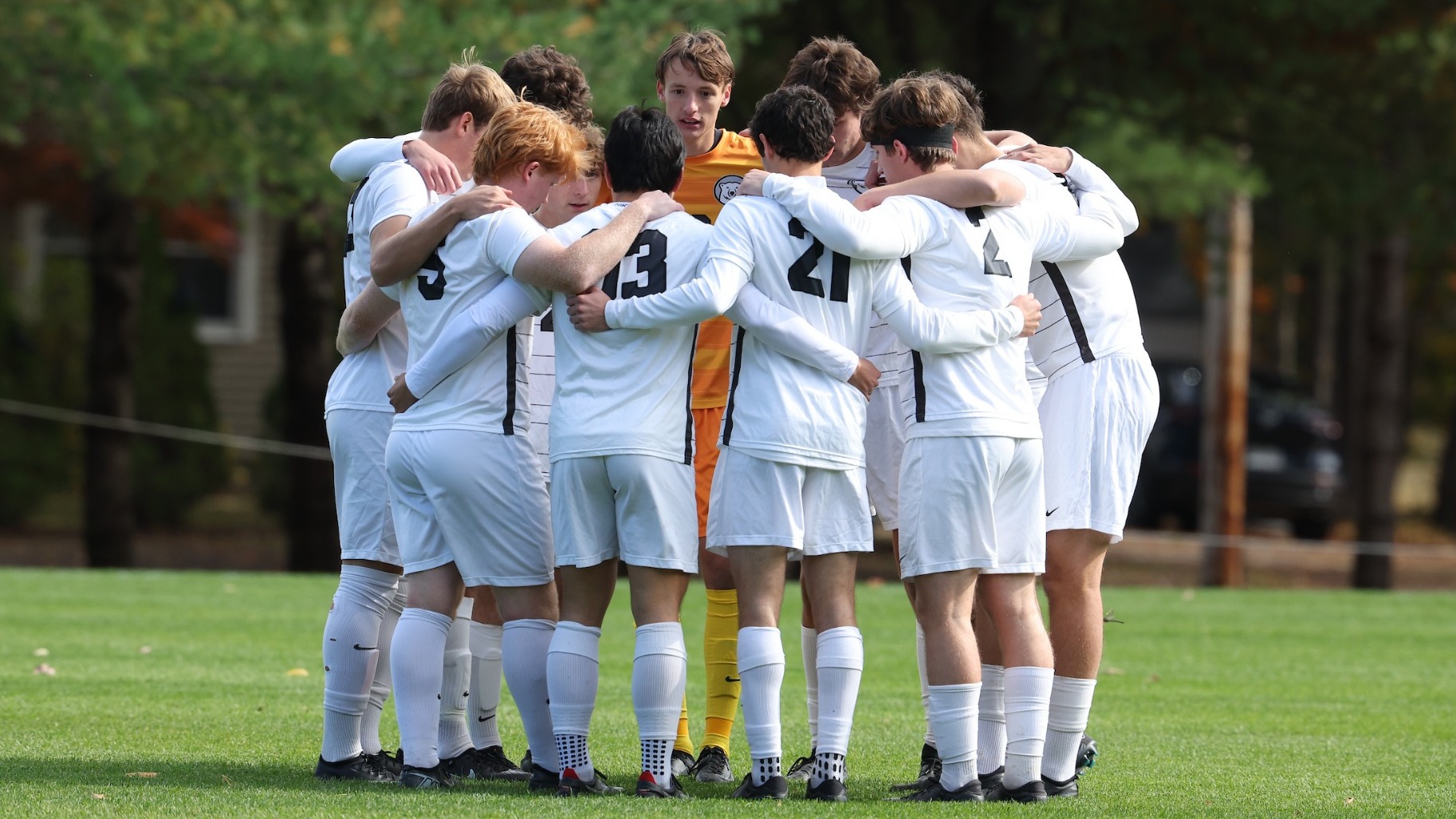 MEn's soccer huddle