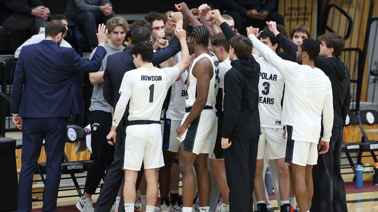 Men's Basketball huddle