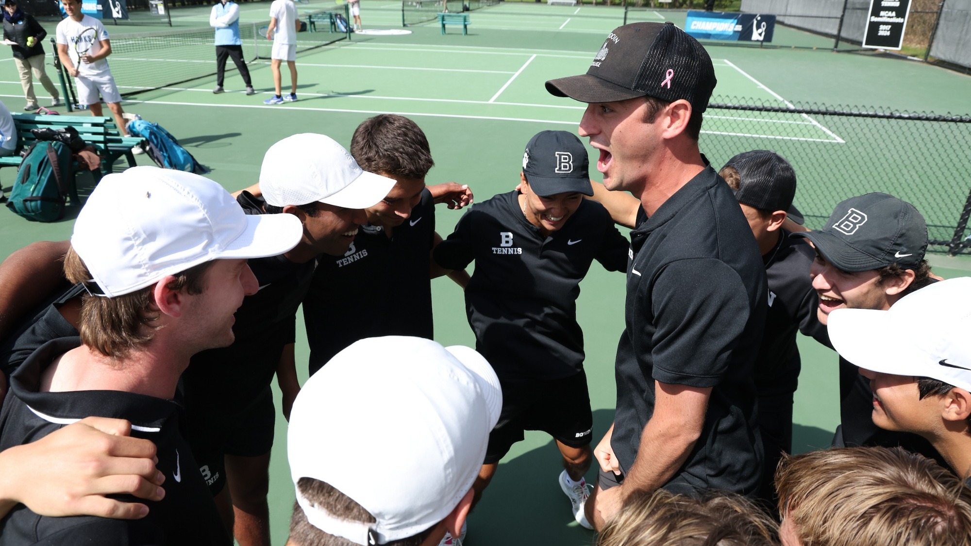 Men's Tennis huddle 
