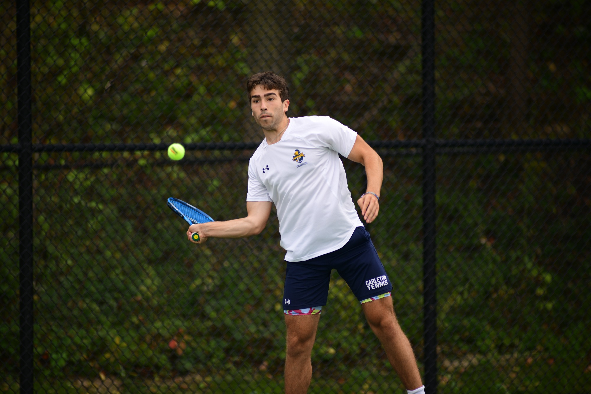 Jack Rivkin hits the ball.