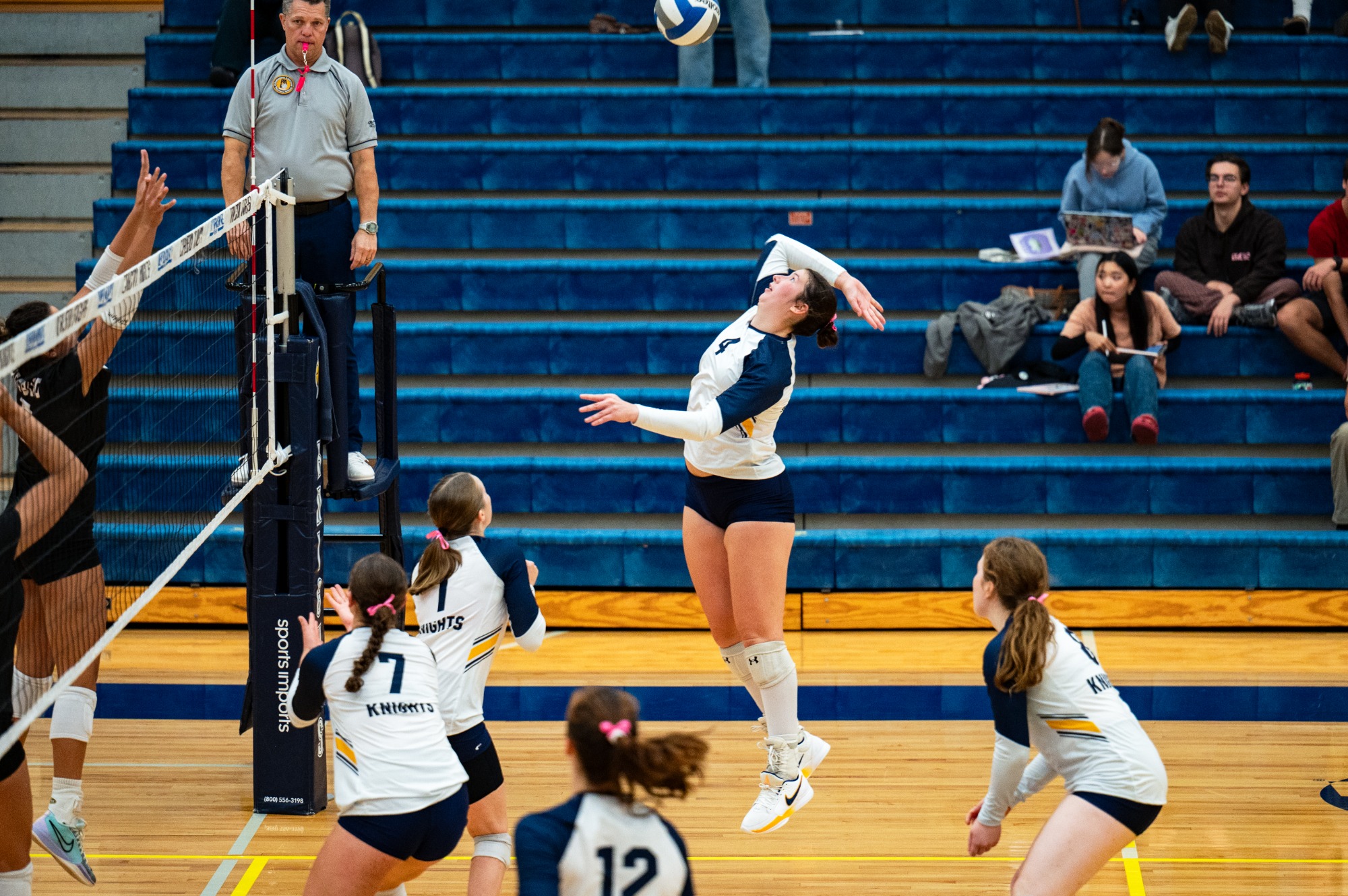 Rachel Bingham goes up for the spike