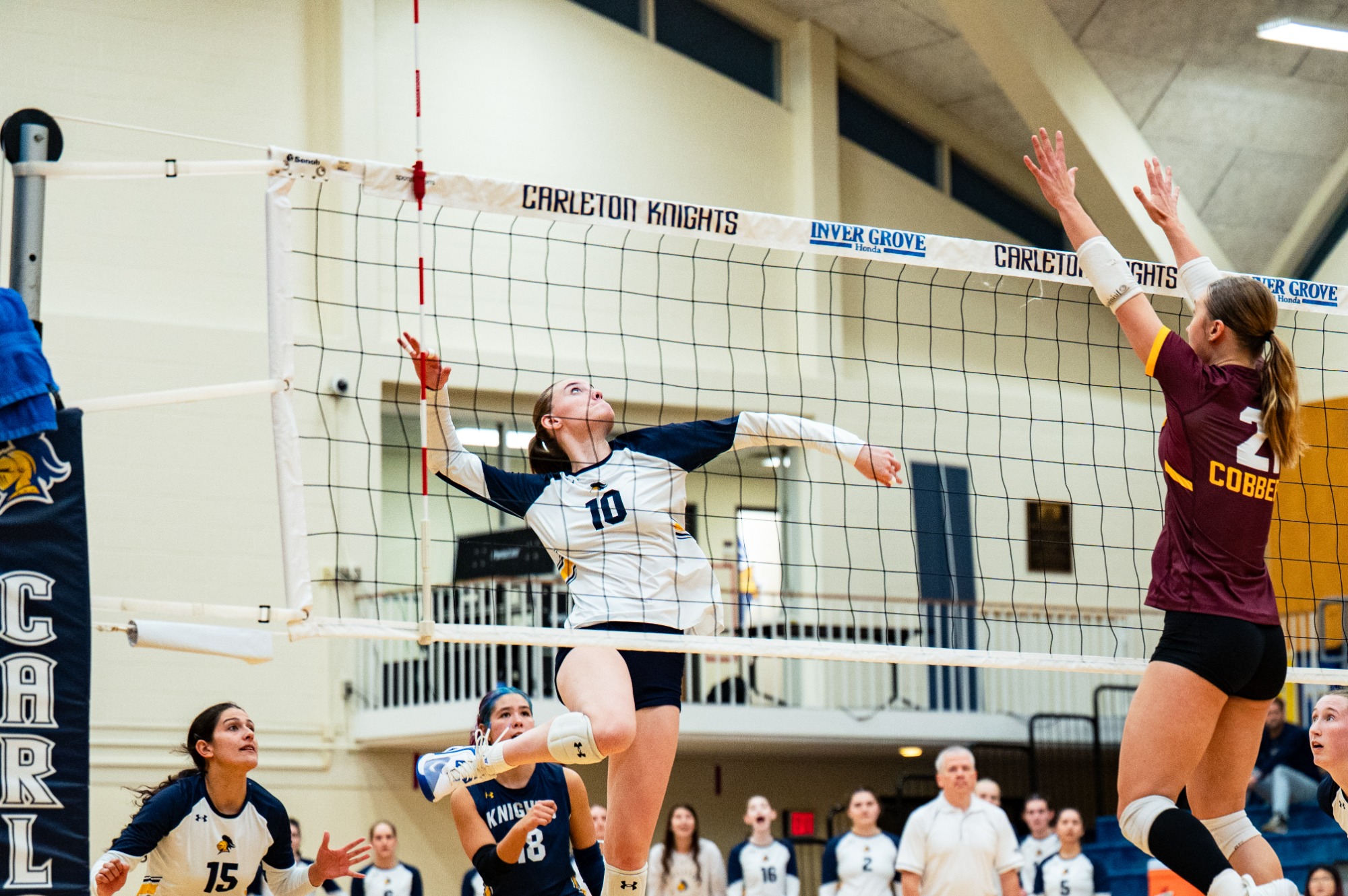 Ella Goolsby goes up for the spike