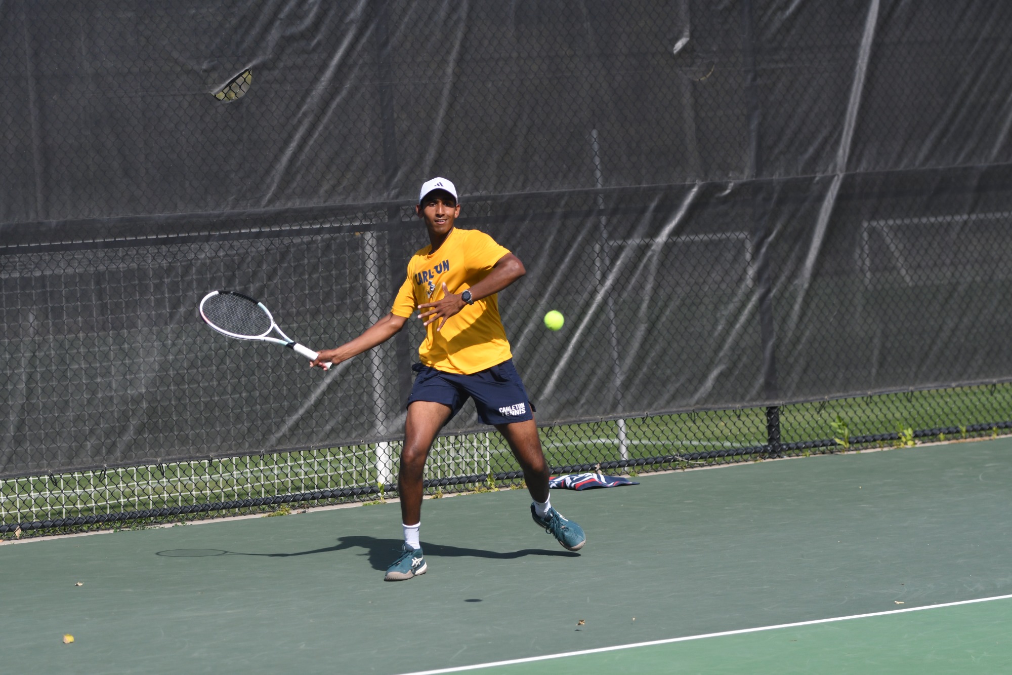 Akshay Garapati draws back to hit the ball