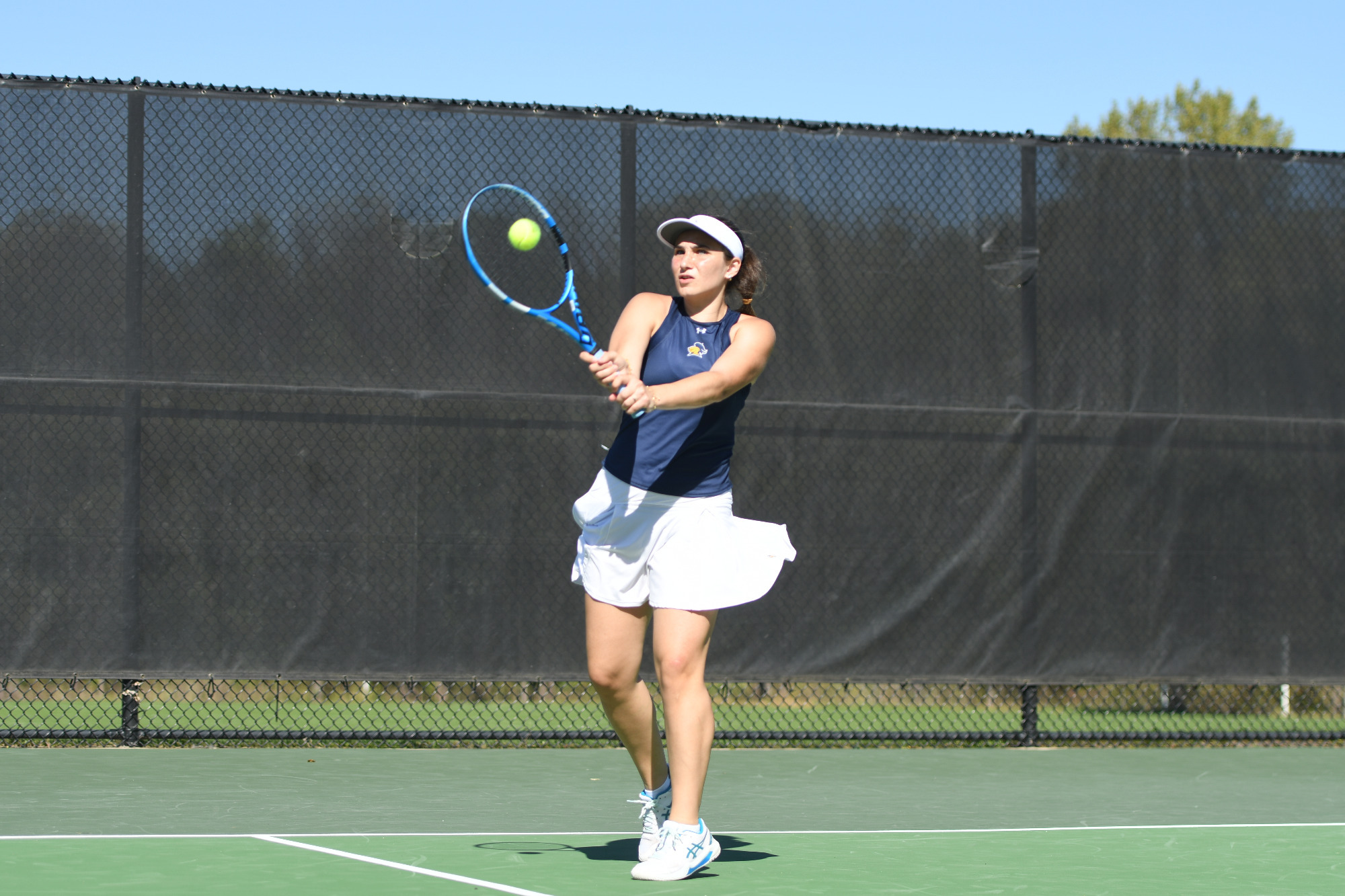 Algara Dineva hits a backhand return