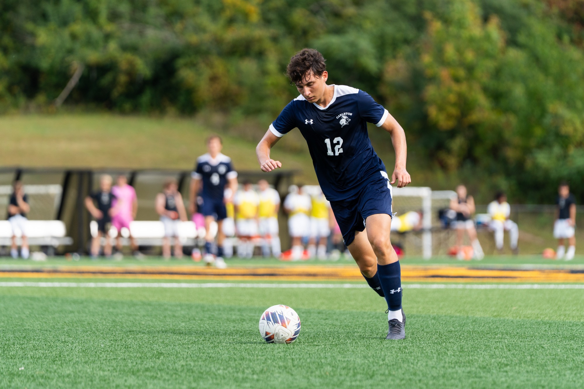 Ben Roman loads up to send a pass toward the goal
