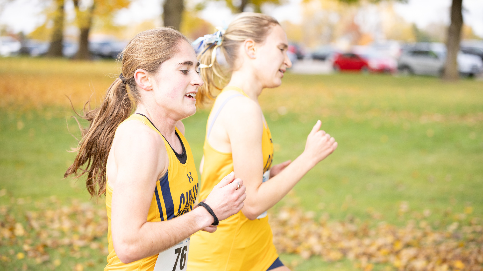 Claire Vukovics and Hannah Preisser running  next to one another