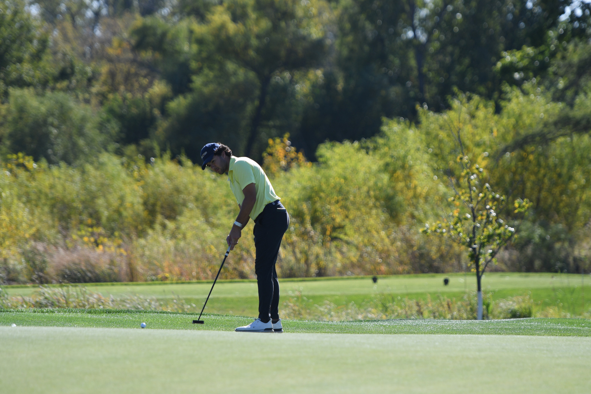 Gordon Walker watches hit putt