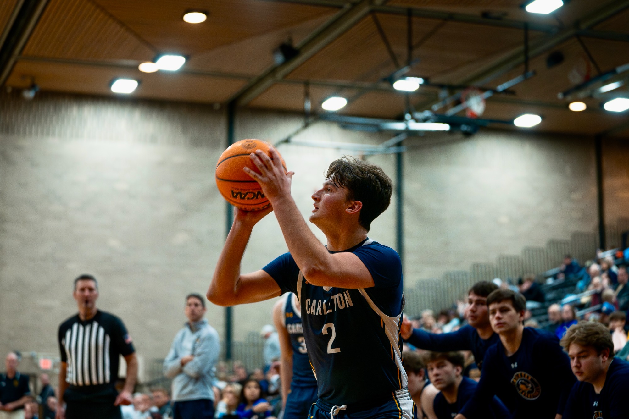 Tobias Averill takes a 3 point shot. 