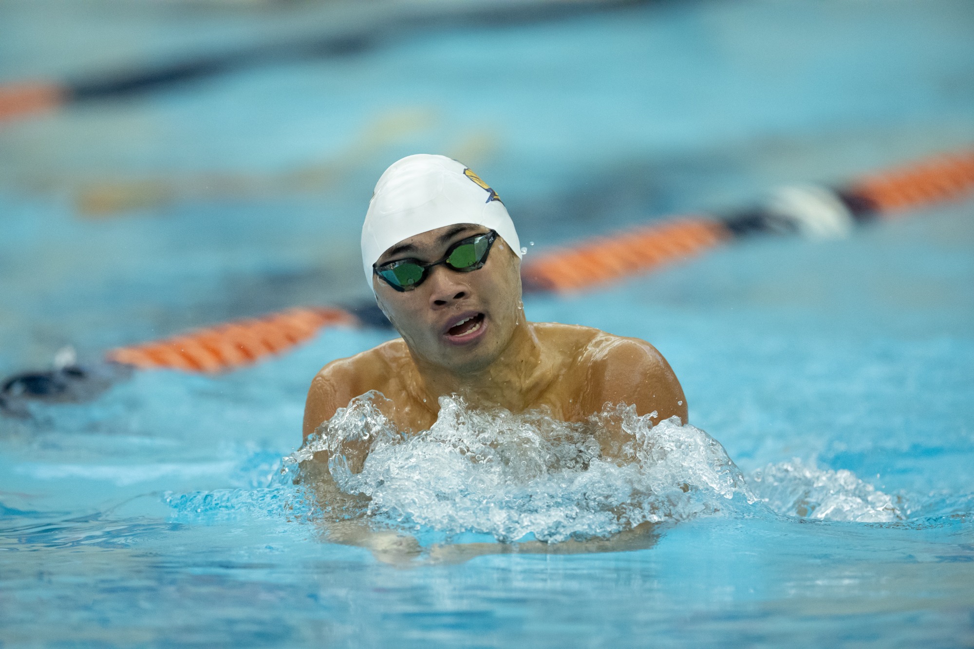 Nicholas Chang comes up above the water. 