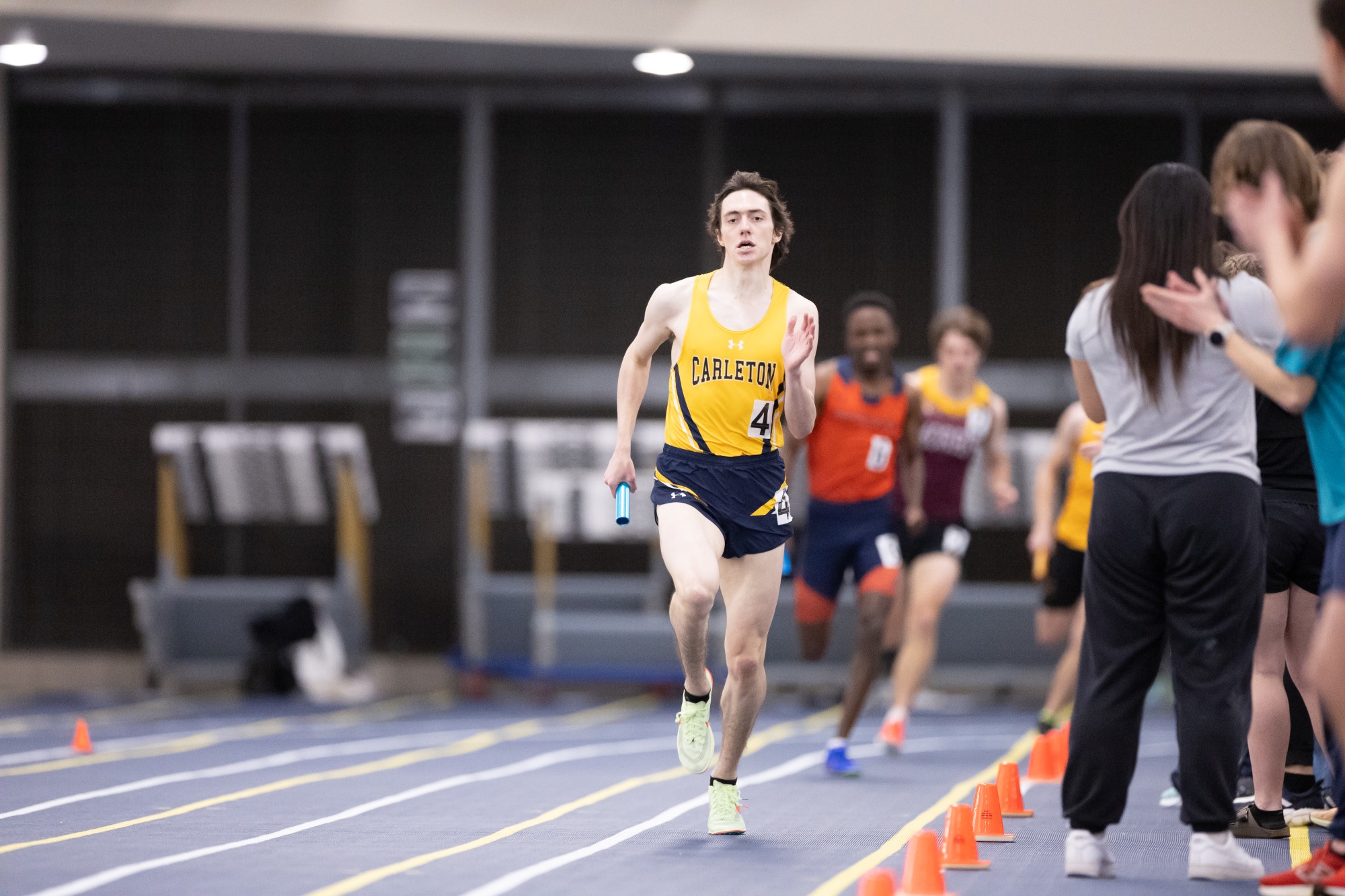 Daniel Scheider pumps his arms to finish the relay. 