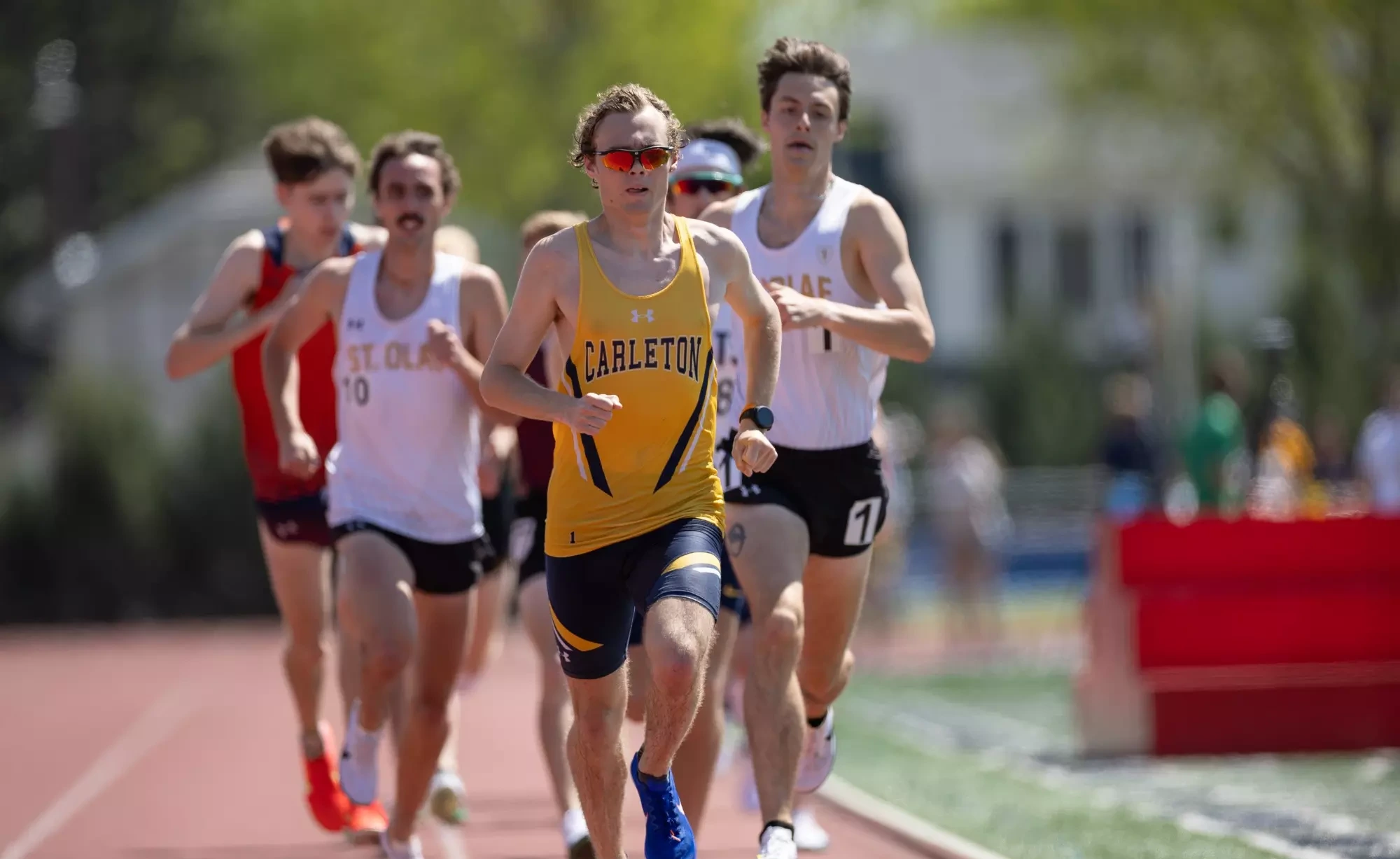 Gabe Nichols leads a pack of runners in the 1500 meter. 