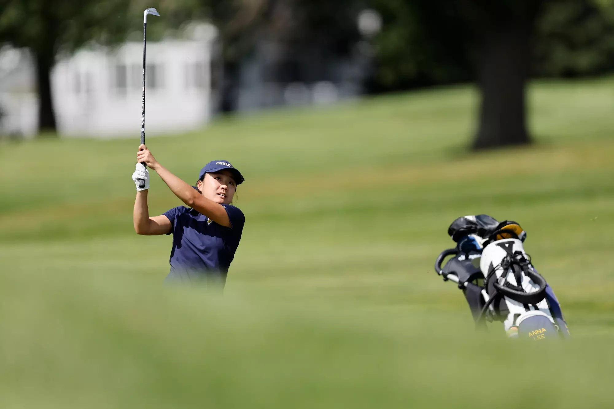 Anna Lee follows through after hitting a shot