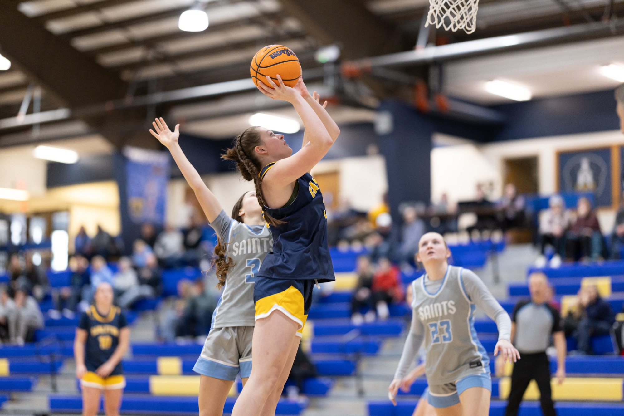 Liesl McCallum goes for a basket. 