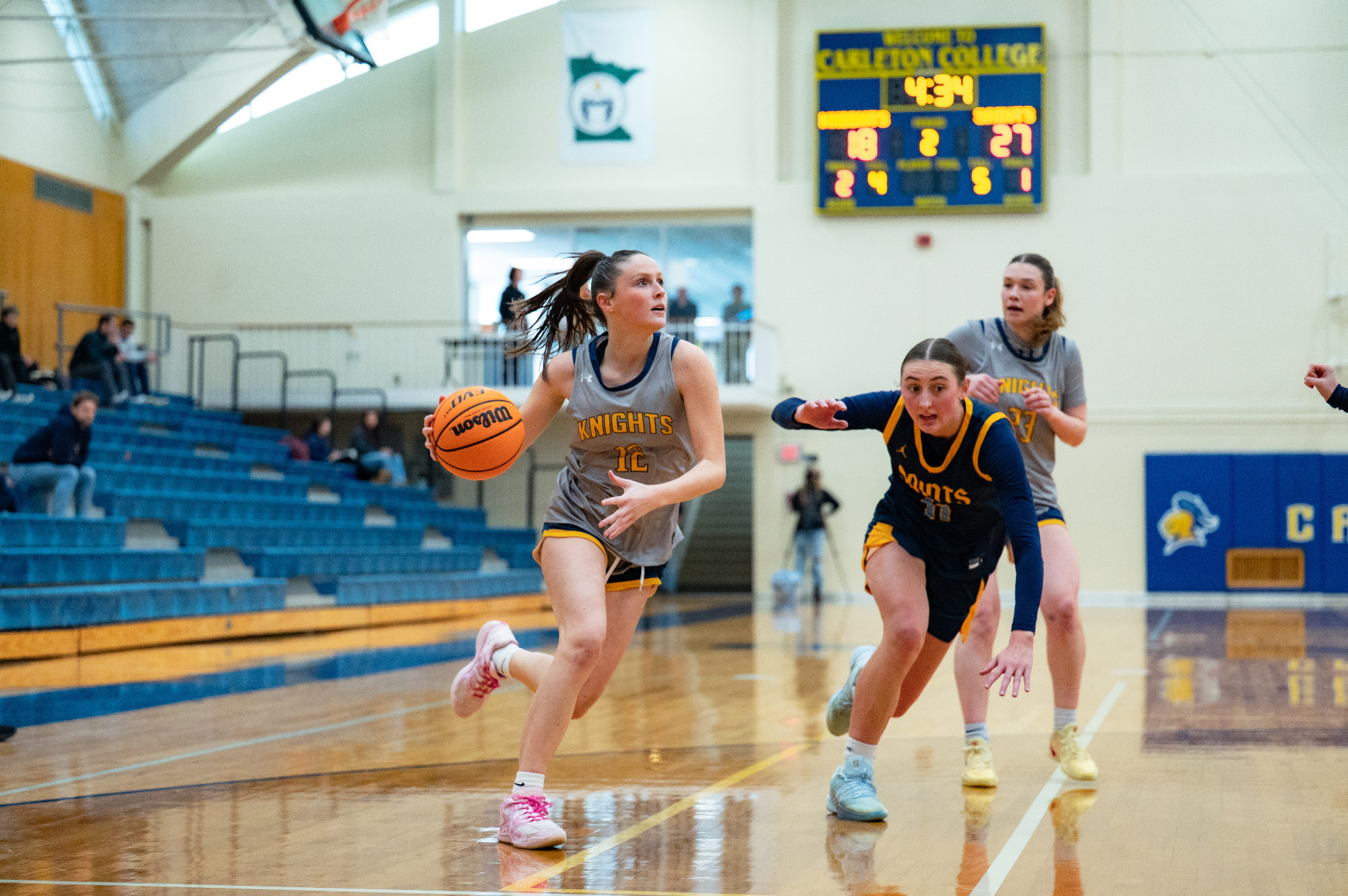 Charlotte Henry dribbles past a defender
