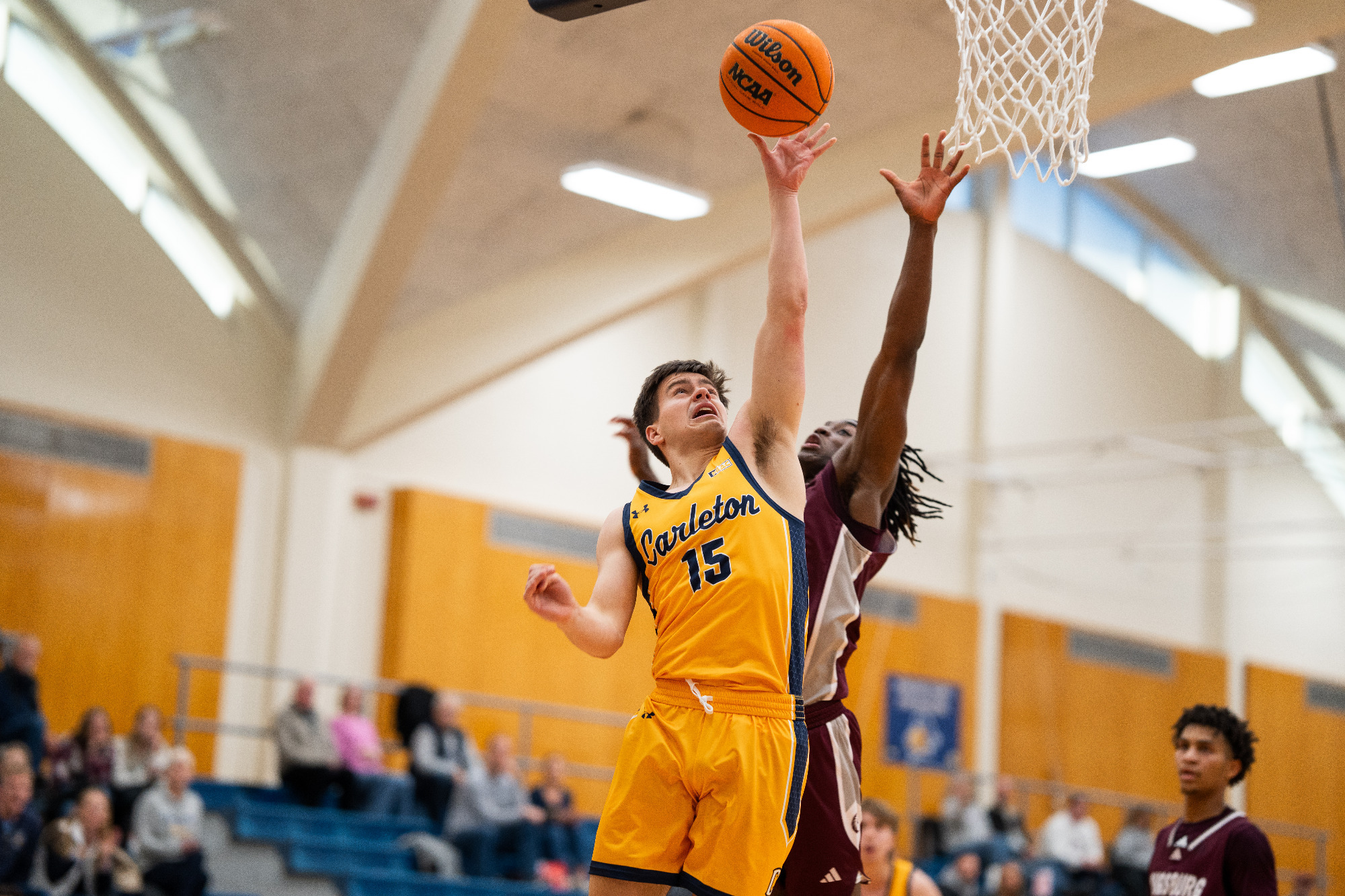 Andrew Weber goes up for a contested layup