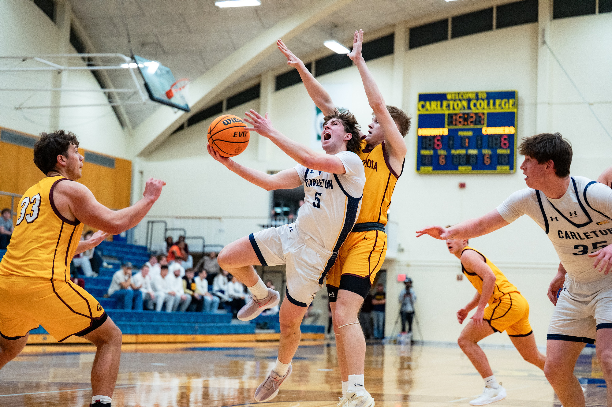 Matt Drake goes up for a contested layup