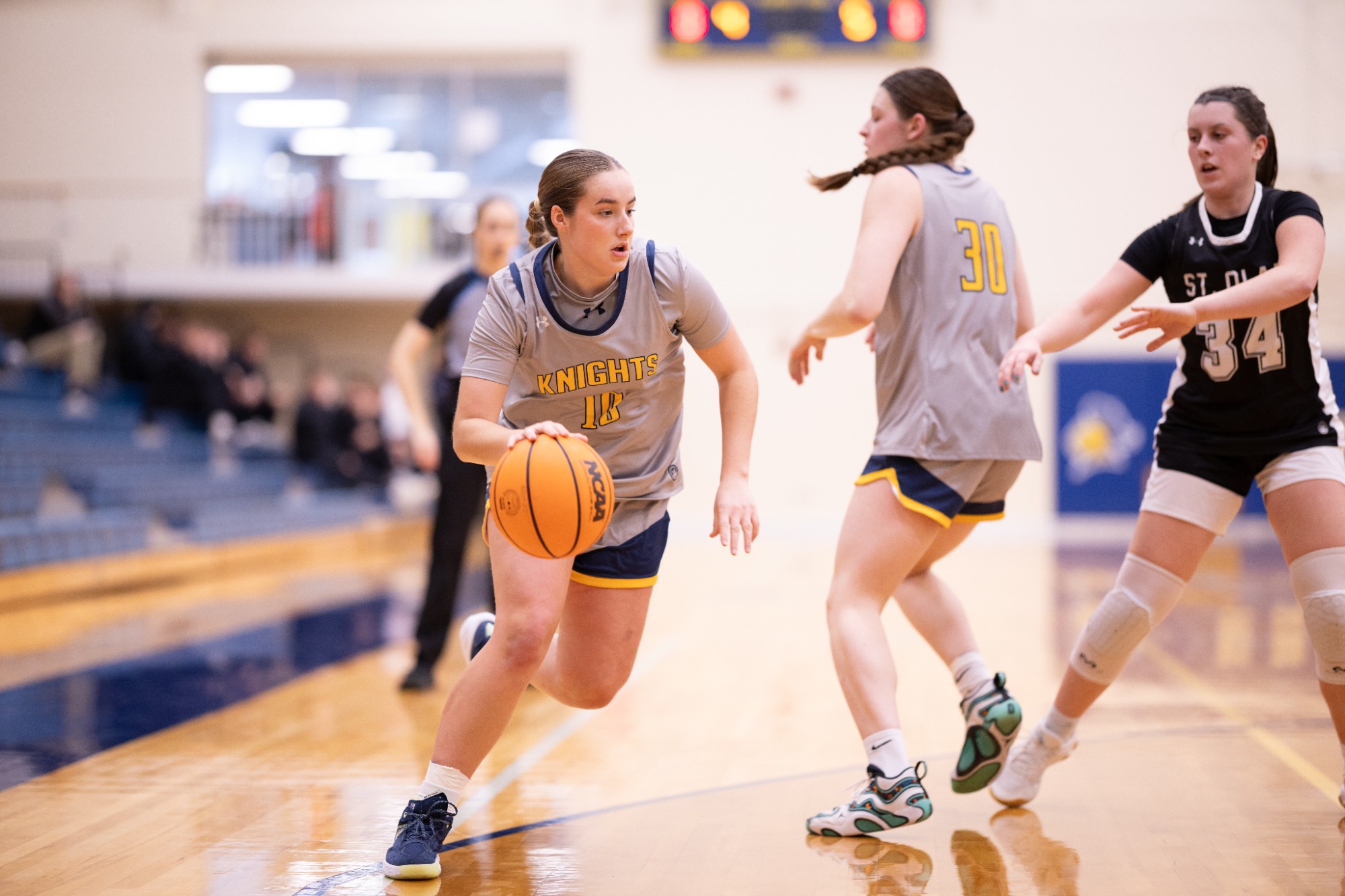 Maggie Winesett dribbles to the basket.