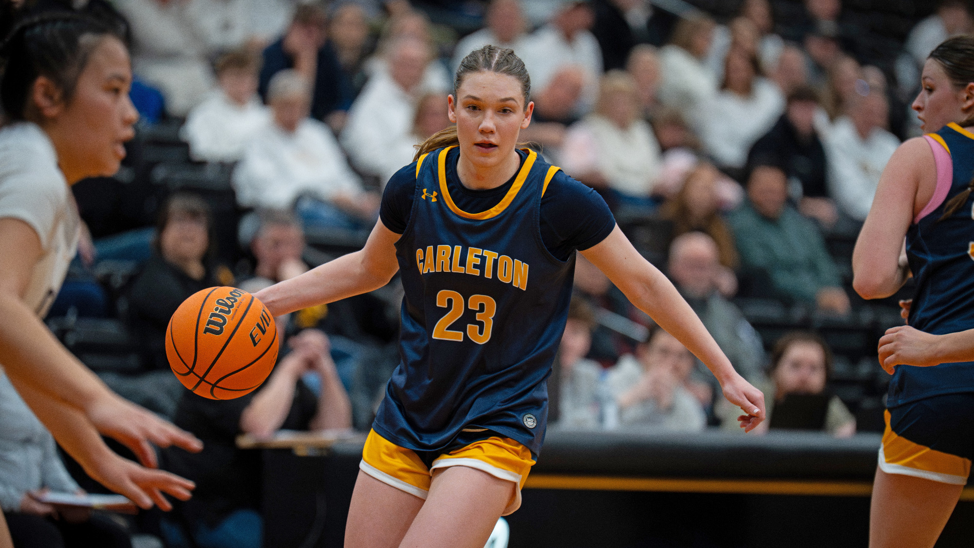 Audrey Whitney dribbling the ball.