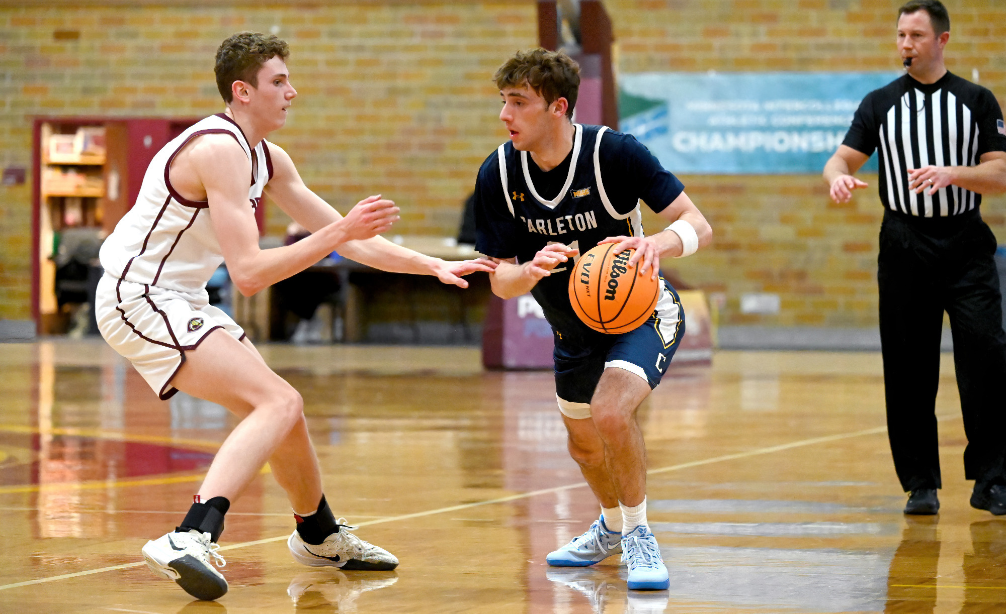 Josh Engelberg dribbling the ball while guarded by a defender