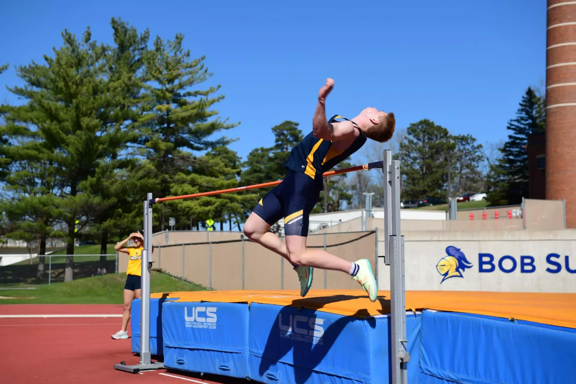 Soren Kaster high jumps.