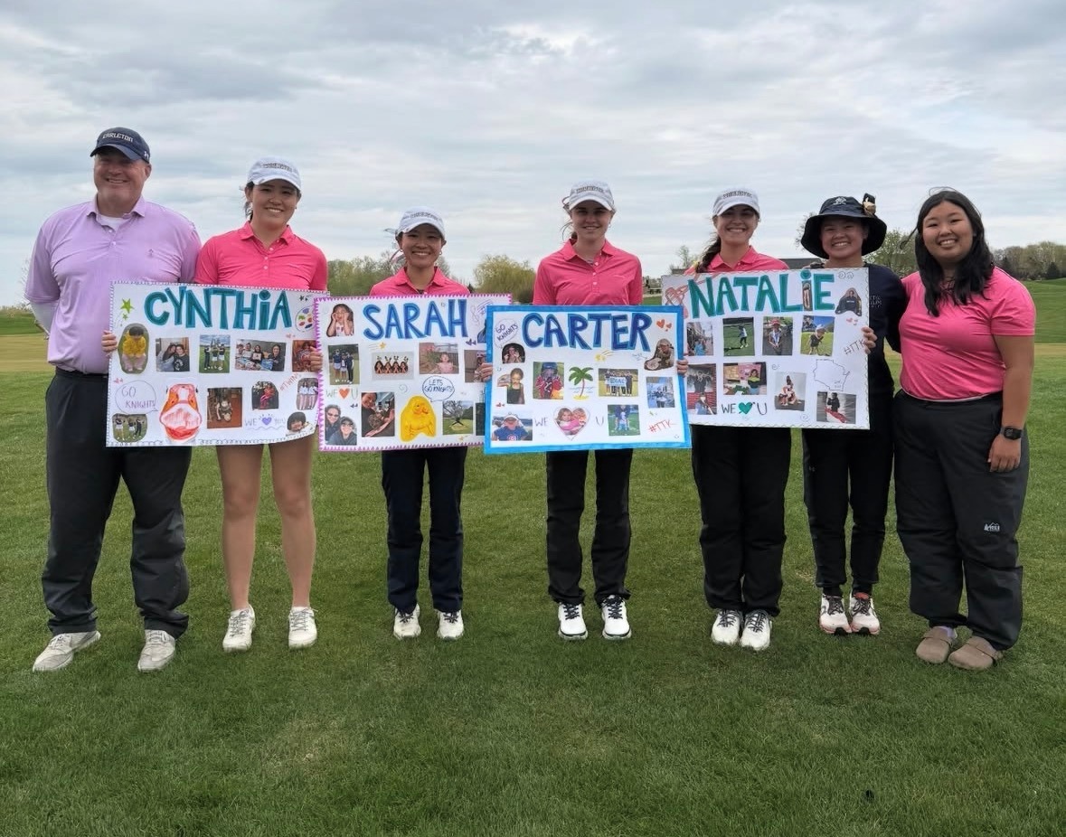 Women's Golf Seniors pose with senior posters