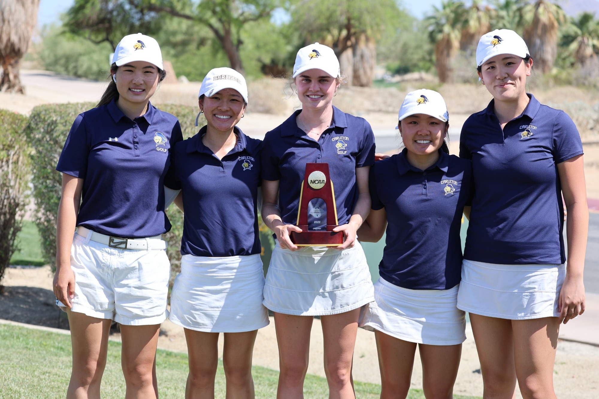 The women's golf team poses following the NCAA Championships