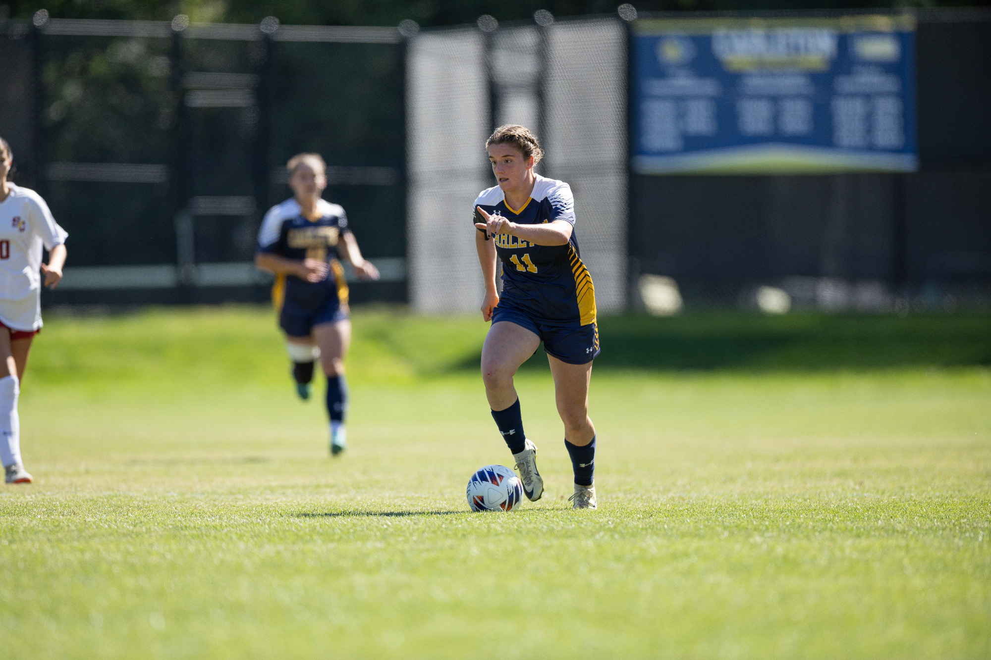 Isabelle Connolly dribbles the ball