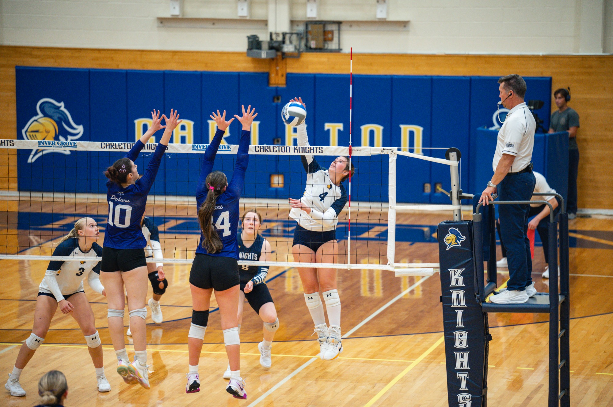 Rachel Bingham gets the kill past two blockers