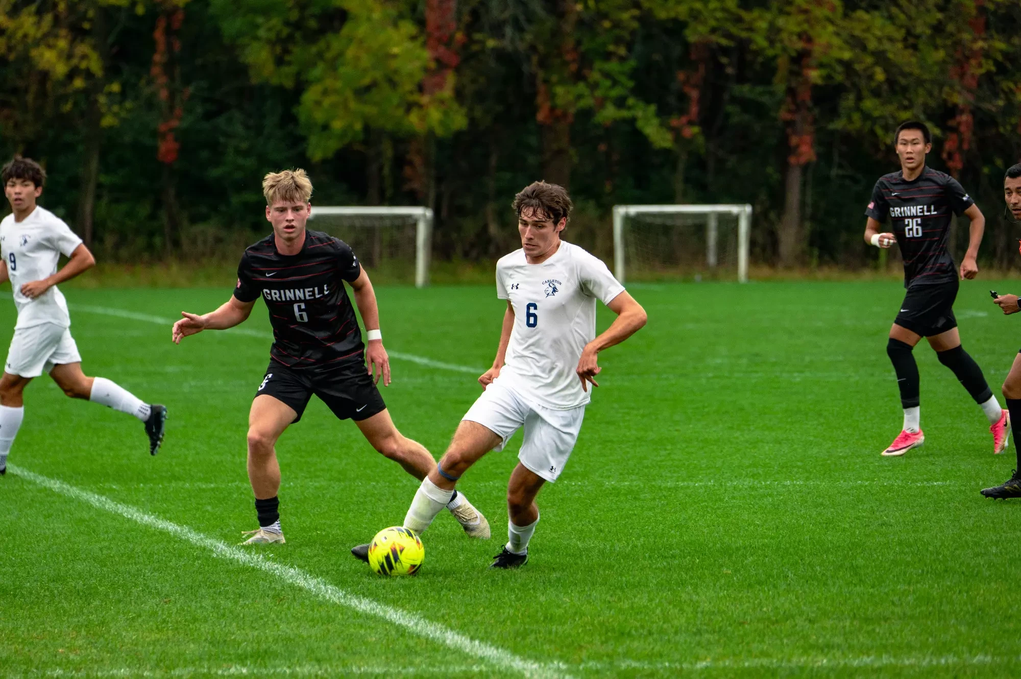 Asher Burt controls the ball at midfield
